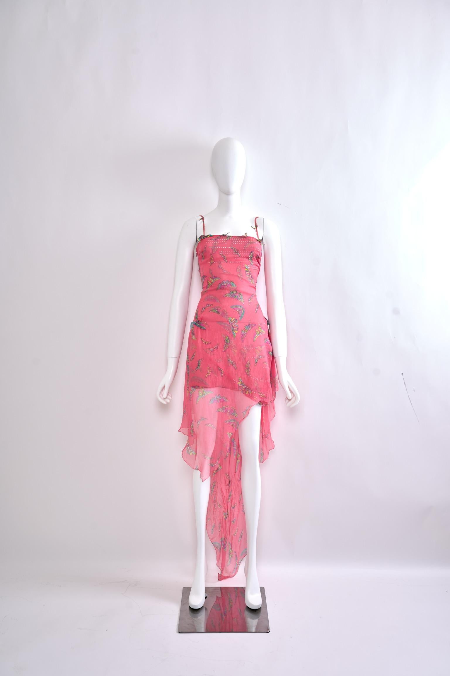 Gianni Versace Autumn-Winter 1999 Pink Silk Chiffon Butterfly Mini Dress

Designer Background
Gianni Versace, a visionary in haute couture, is celebrated for his daring designs and innovative use of fabrics. His Autumn-Winter 1999 collection