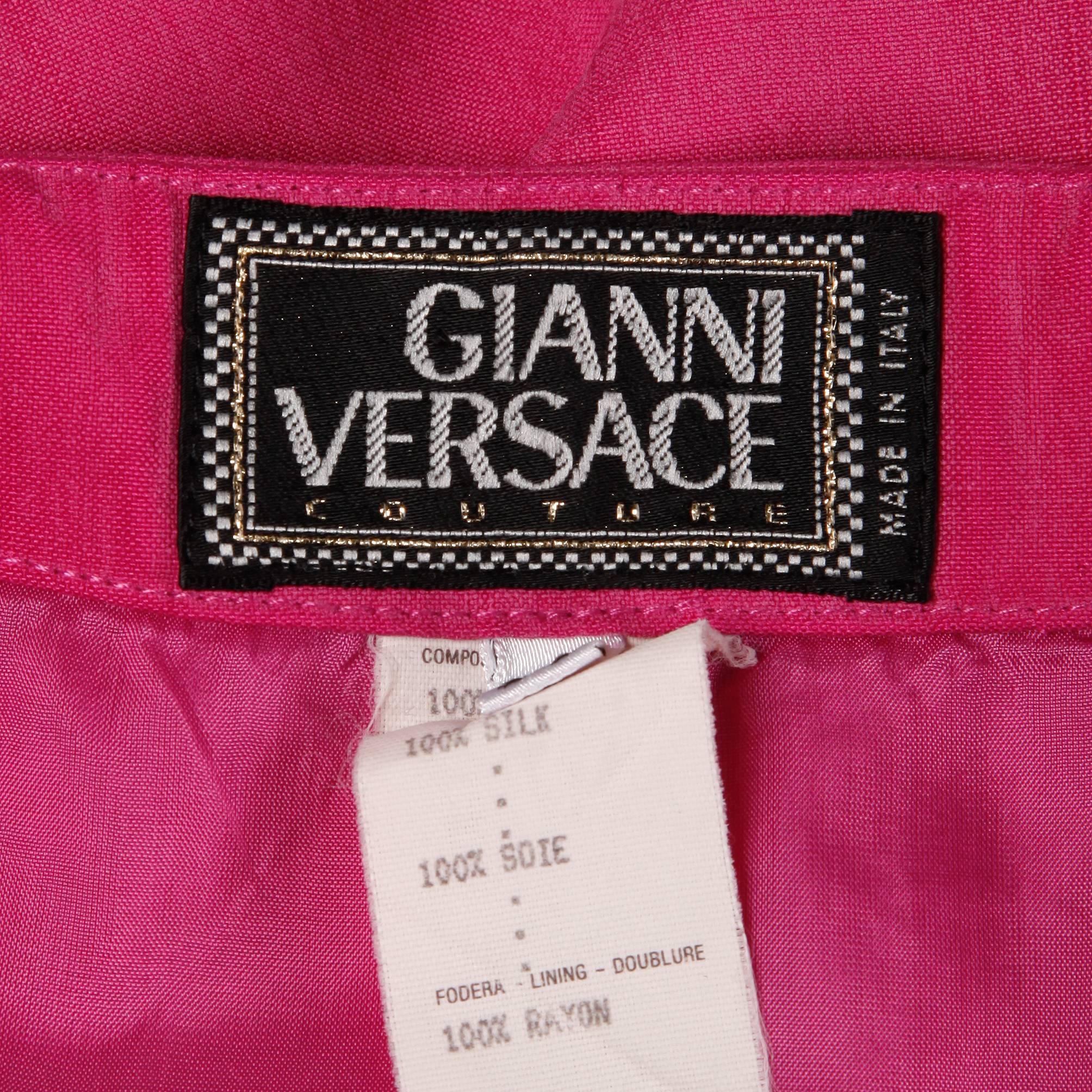 Bright pink silk skirt with iconic medusa buttons by Gianni Versace.

Details: 

Fully Lined
Button Front Closure
Marked Size: 4
Estimated Size: XS-S
Color: Bright Pink
Fabric: 100% Silk
Label: Gianni Versace Couture

Measurements: 

Waist: