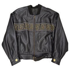 1990s Gianni Versace leather jacket with gold studs details