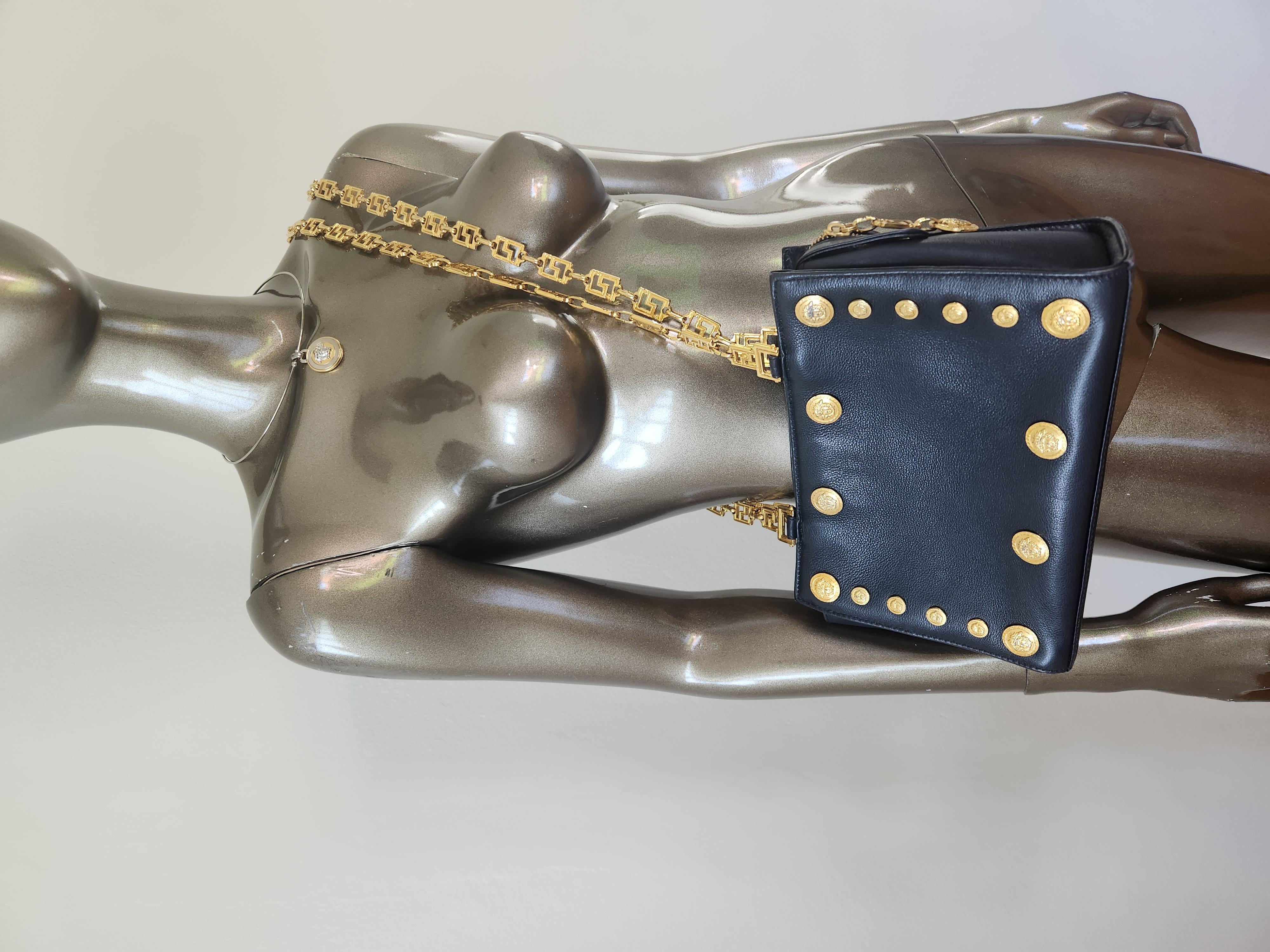 90s Versace signature original greca goddess bag, extremely rare in this size, which is a perfect everyday size to fit your tablets, makeup and etc.

Feature
Colour: Black with Gold Hardware
Material: Leather
Condition: Good,some discolouration on