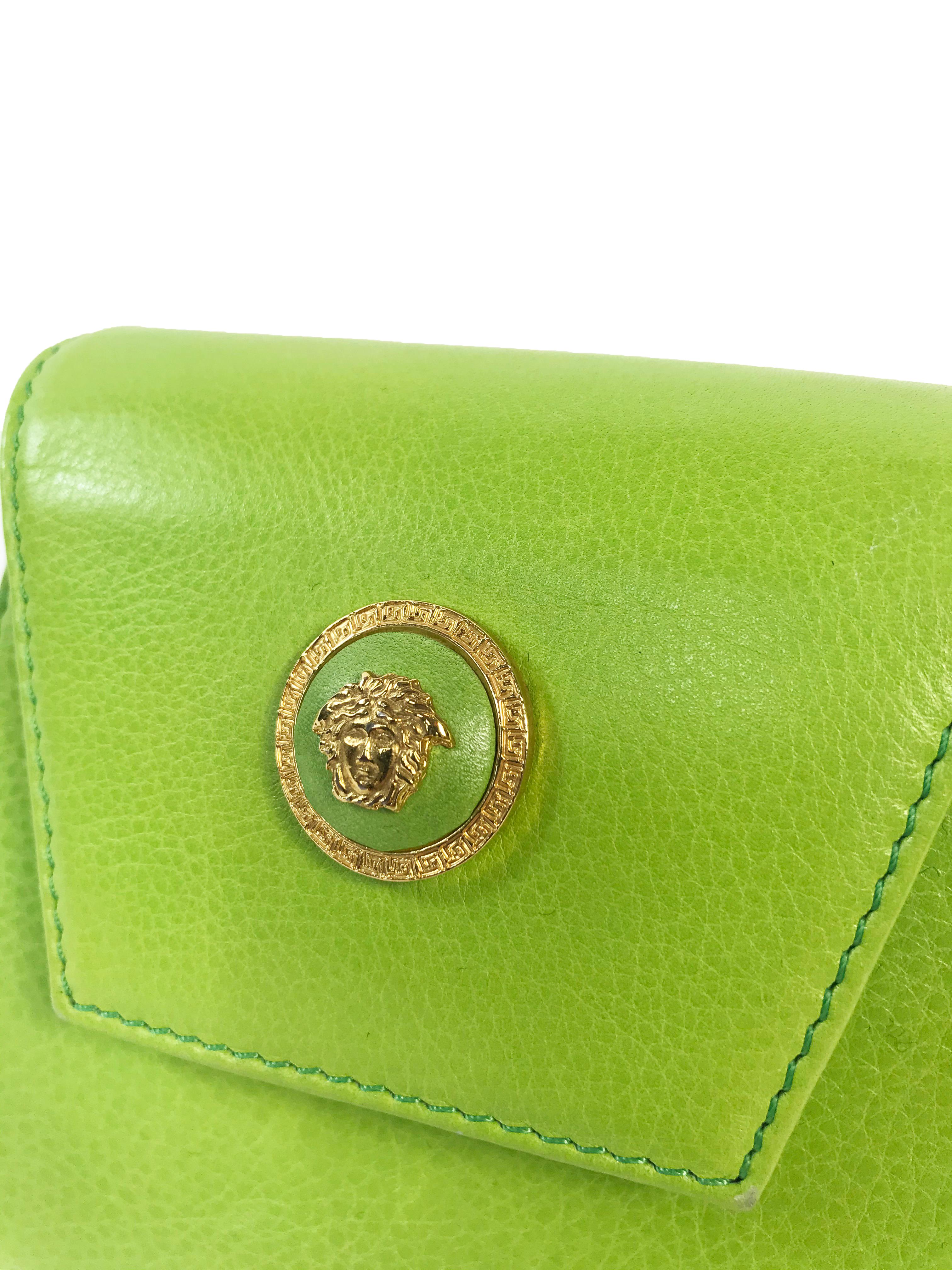 Green 1990s Gianni Versace mini leather wristlet with medusa accents