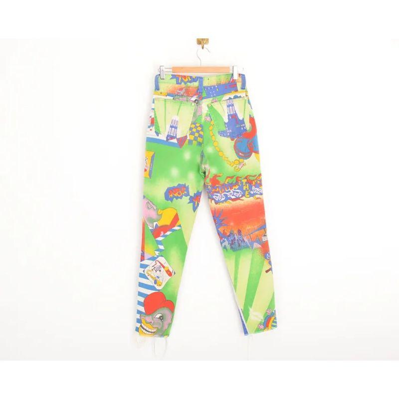 Superb, Garish Early 1990's Versace Jeans Couture high waisted jeans. 

Depicting an Iconic, colourful 'New York City Jazz' printed pattern on both front and reverse. This model is both incredibly rare and sough after. 

Features:
Zip fasten
Classic