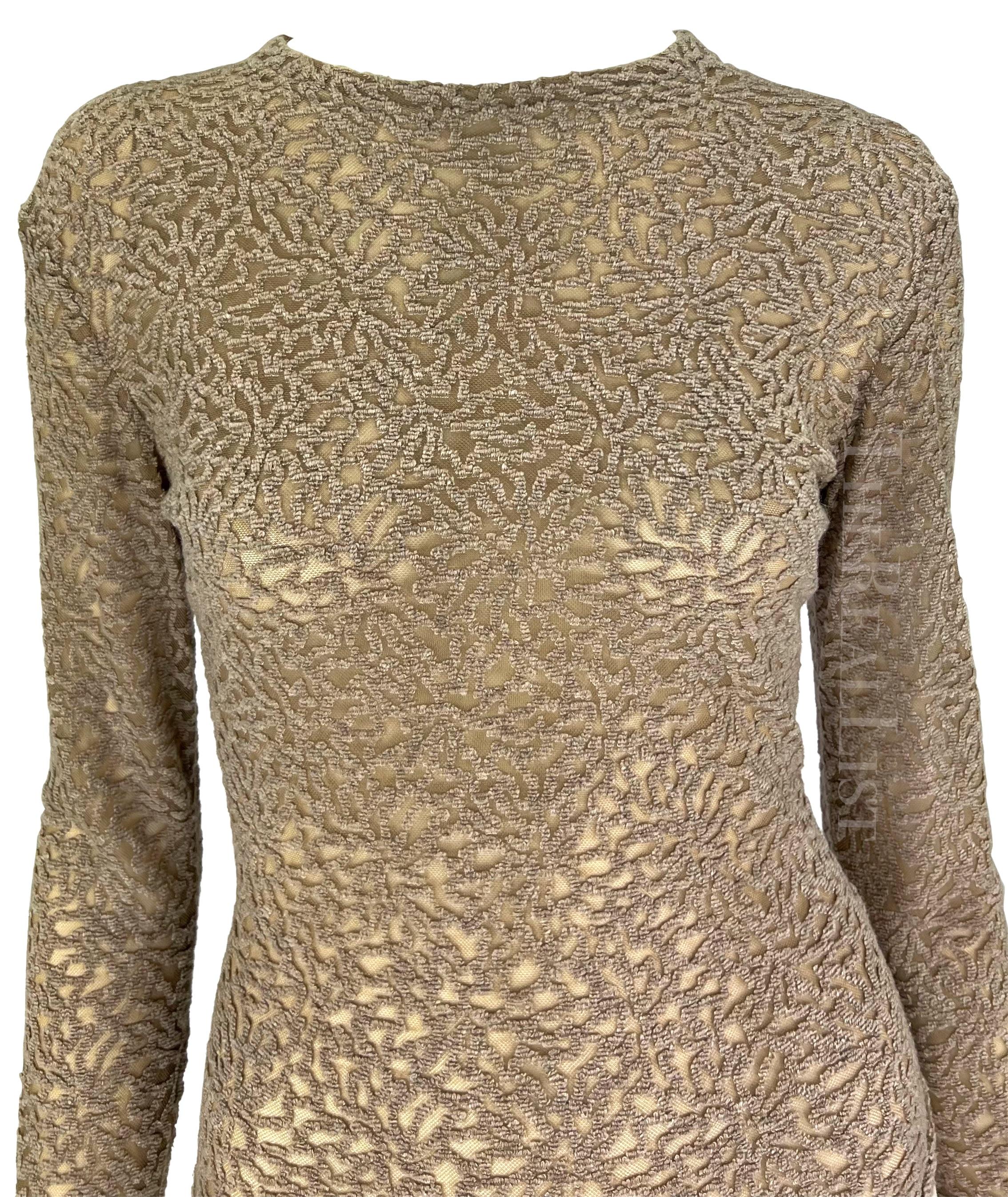 TheRealList presents: a semi-sheer bodysuit designed, by Gianni Versace. From the 1990s, the pattern is applied to sheer fabric in boucle yarn to create a velvet-like texture. Easy to dress up or down, this piece is the perfect chic addition to any
