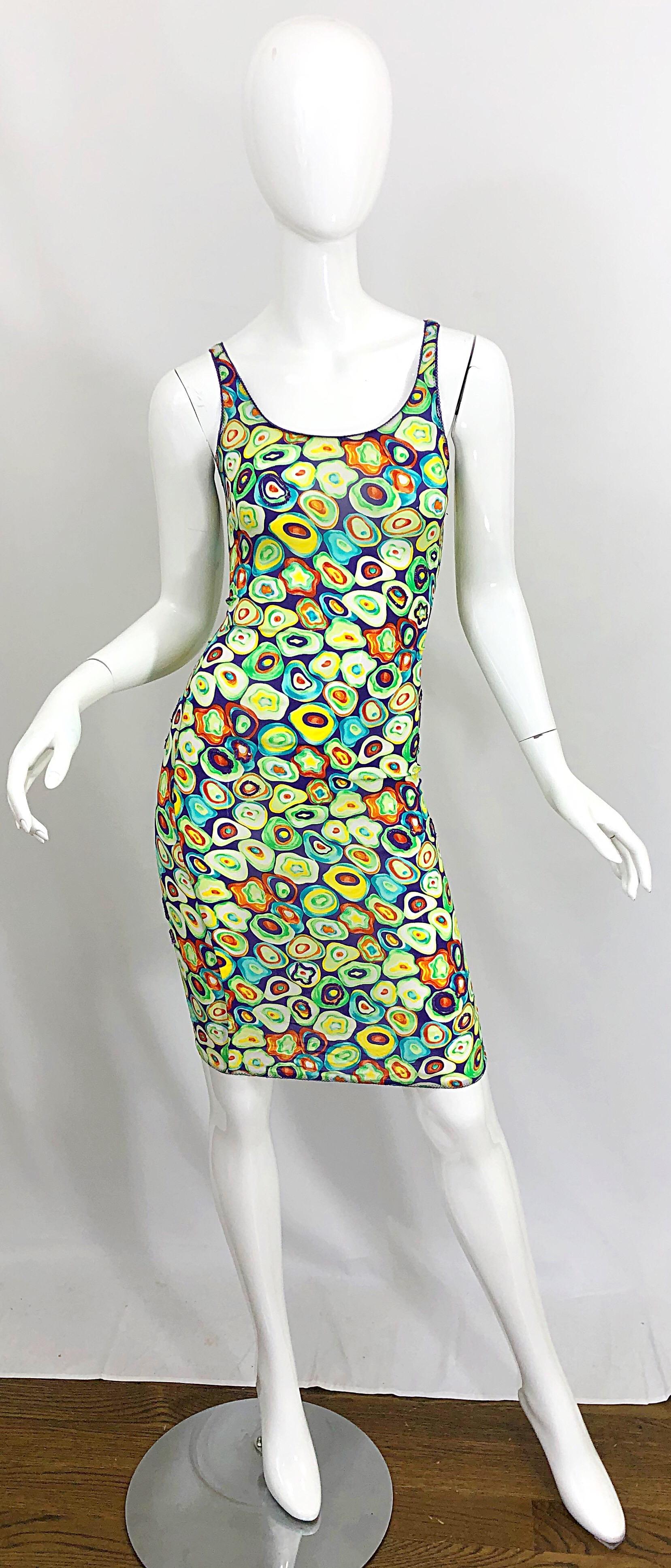 Fun vintage 90s GIANNI VERSACE colorful sushi novelty print bodcon sequin dress! Features vibrant colors of purple, yellow, green, turquoise, orange and white throughout. Purple sequins sporadically sewn around sushi throughout the dress. Simply