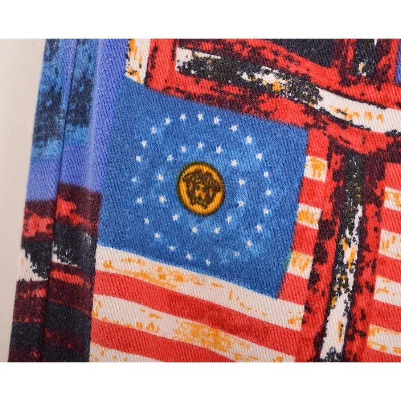 Early 1990s Versace Jeans Couture high waisted jeans, with Various including US & UK Union Jacks as well as the iconic Versace Medusa logo throughout.

(We also have the matching shirt available to purchase from our store, please see