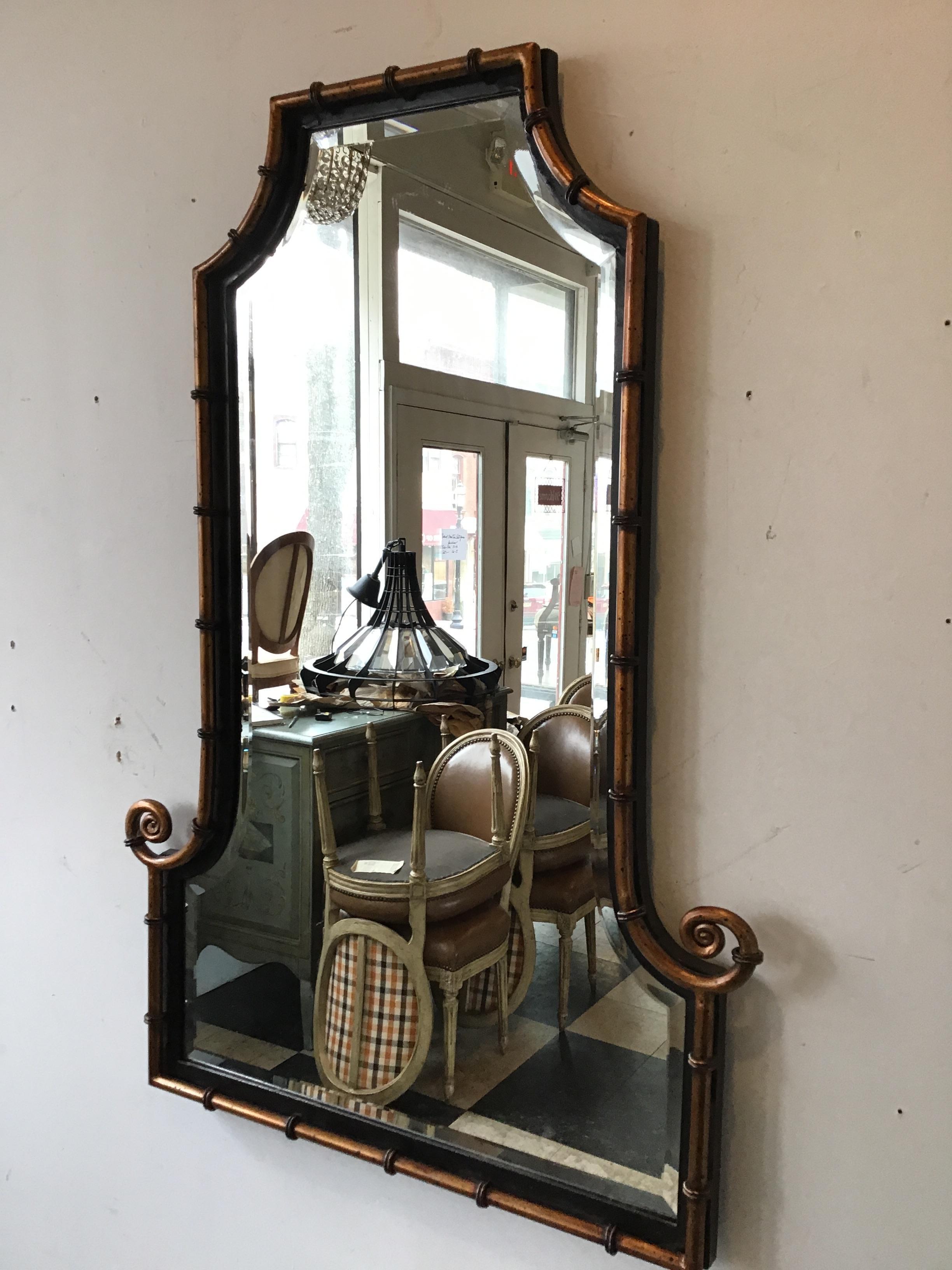 1990s gilt iron faux bamboo beveled mirror.
