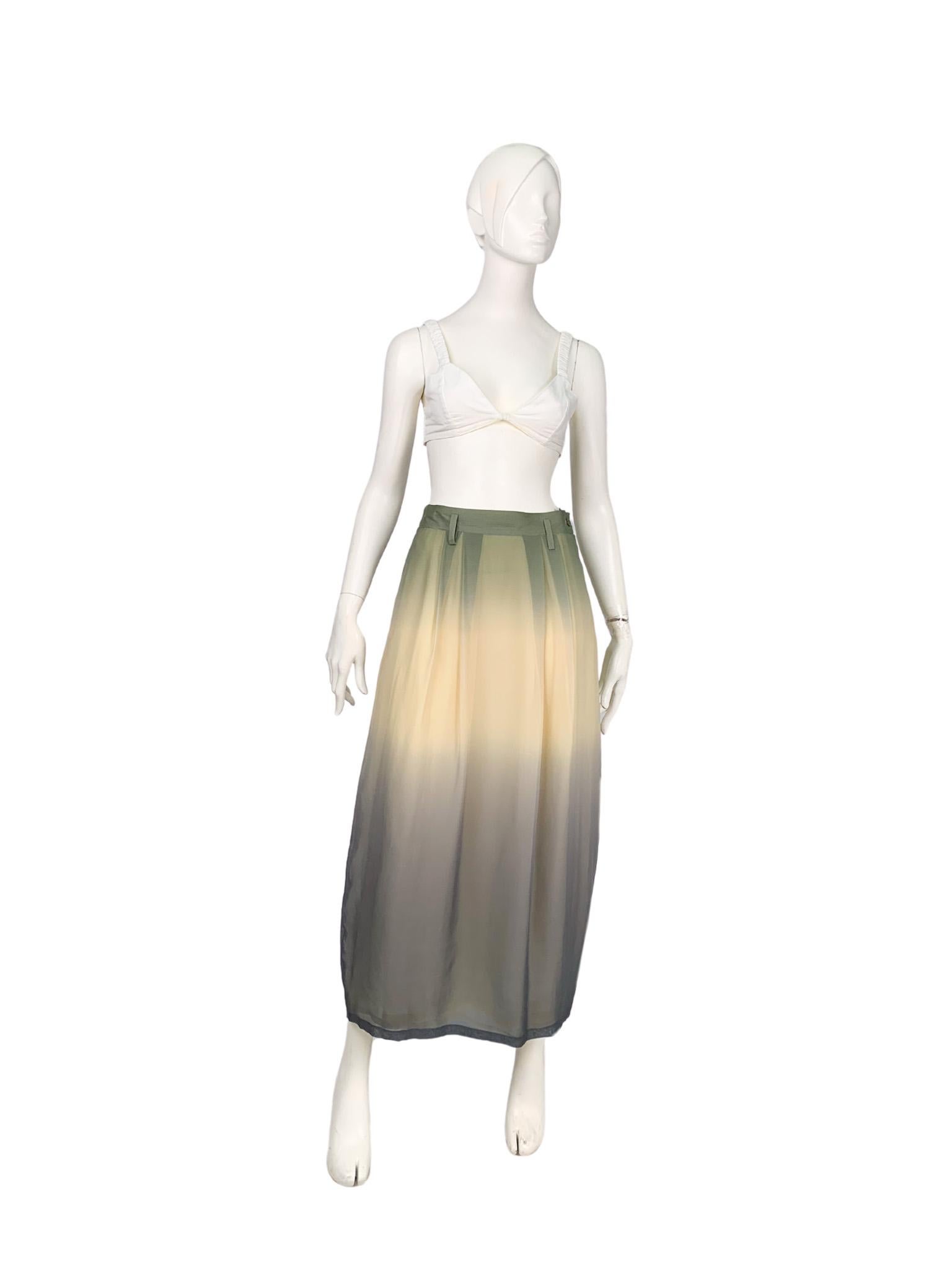 Vintage 1990s Giorgio Armani printed maxi skirt in 100% pure silk with ombré effect in soft shades of green, yellow, and grey. High-waisted with folds at waist, it has a refined slightly rounded shape that widens from the waist and narrows to the