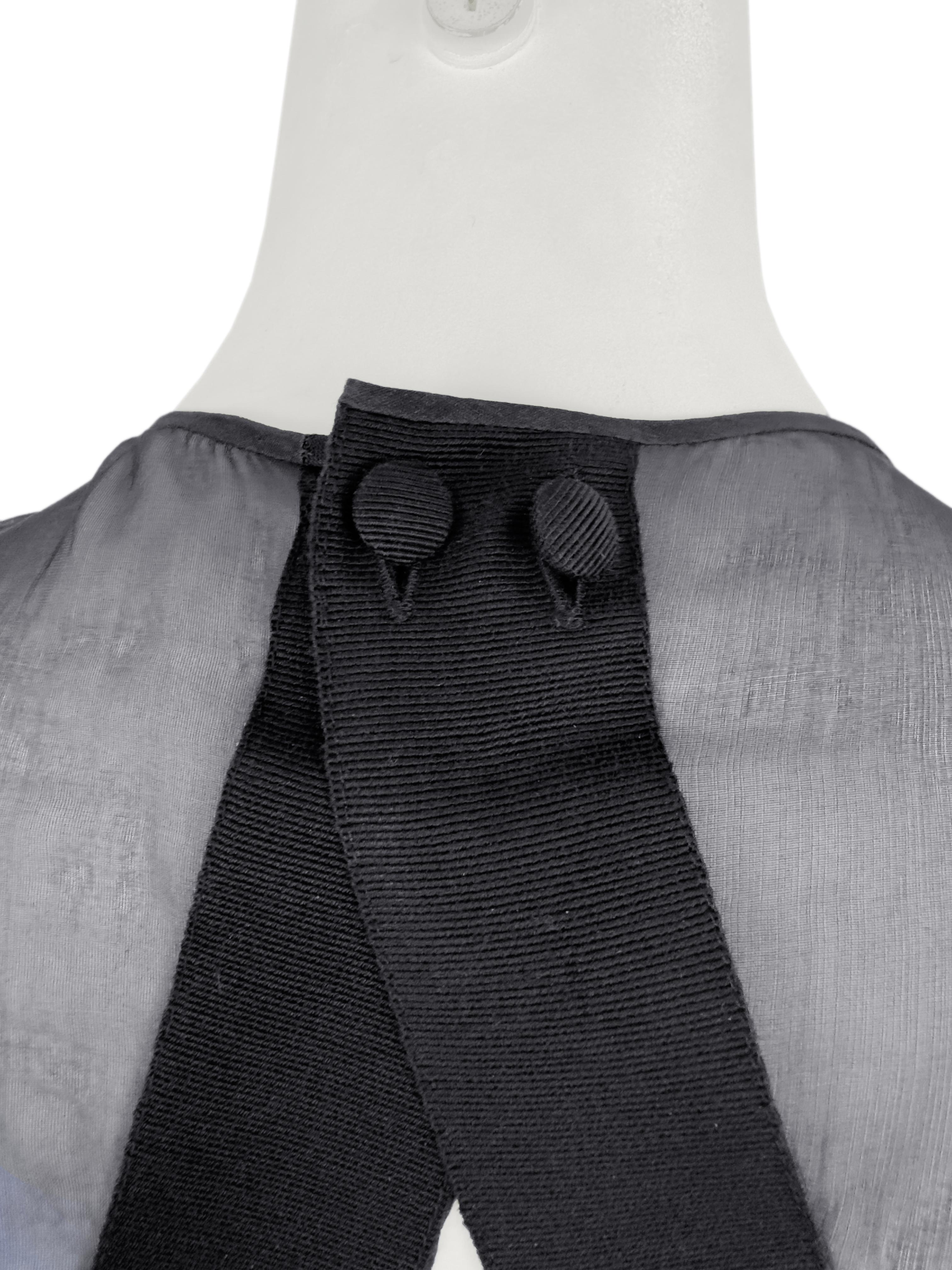 Donna Giorgio Armani anni '90, abito nero senza maniche con pannelli trasparenti e schiena scoperta in vendita