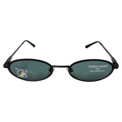 1990s Giorgio Armani Blue Tinted Black Metal Skinny Oval Sunglasses