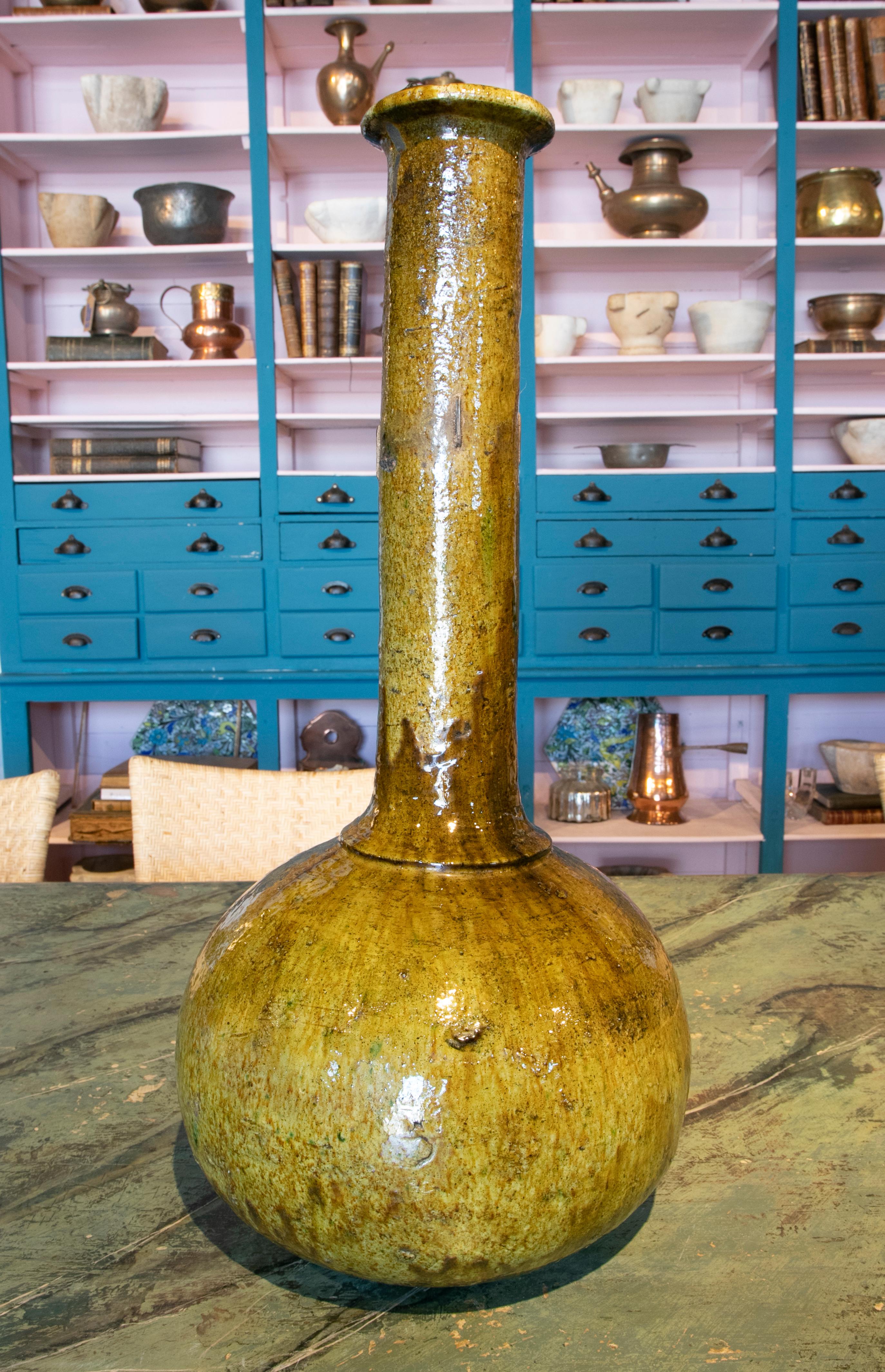 1990s Glazed ceramic vase with high neck.