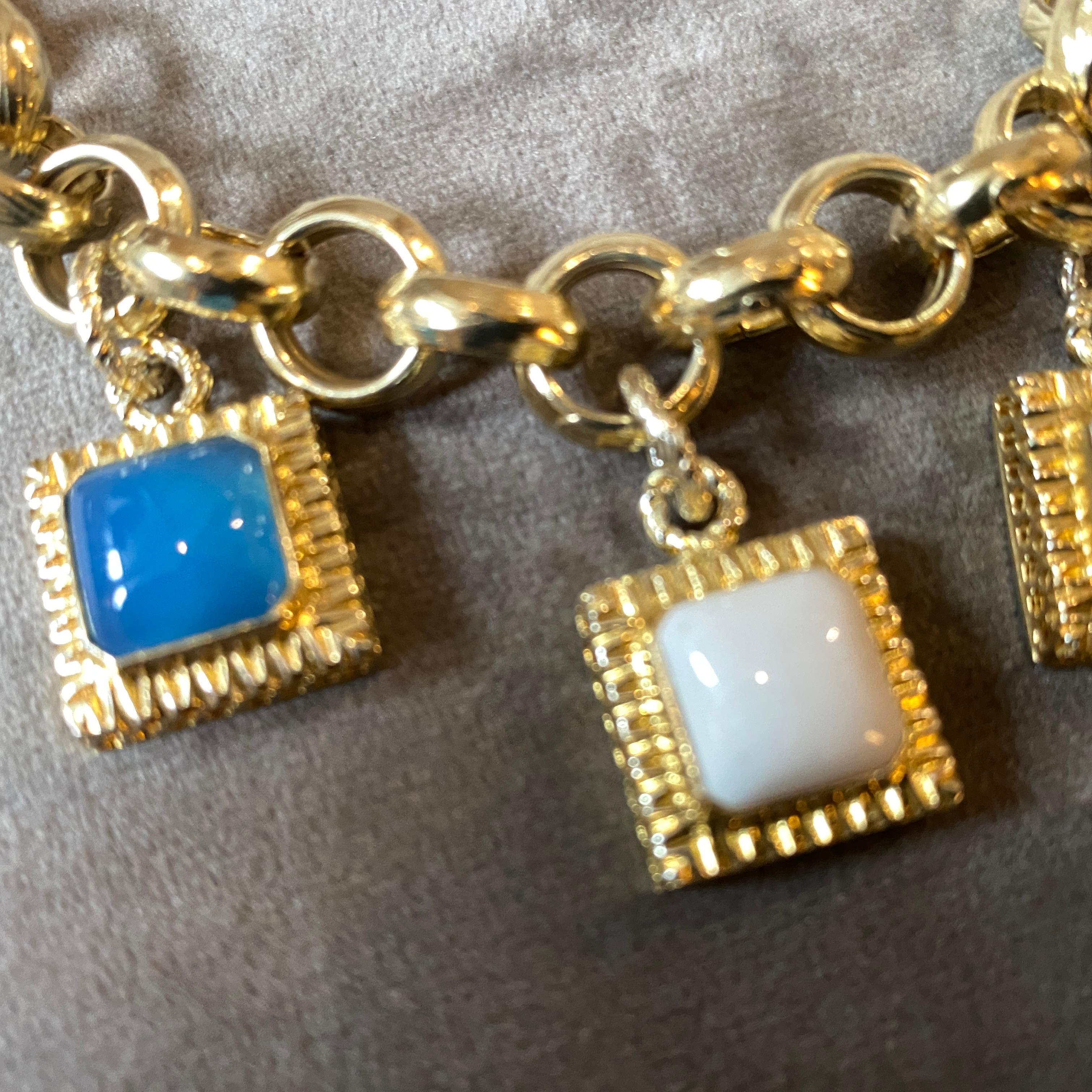 1990s Glided Sterling Silver and Semi Precious Stones Italian Charm Bracelet In Excellent Condition For Sale In Aci Castello, IT