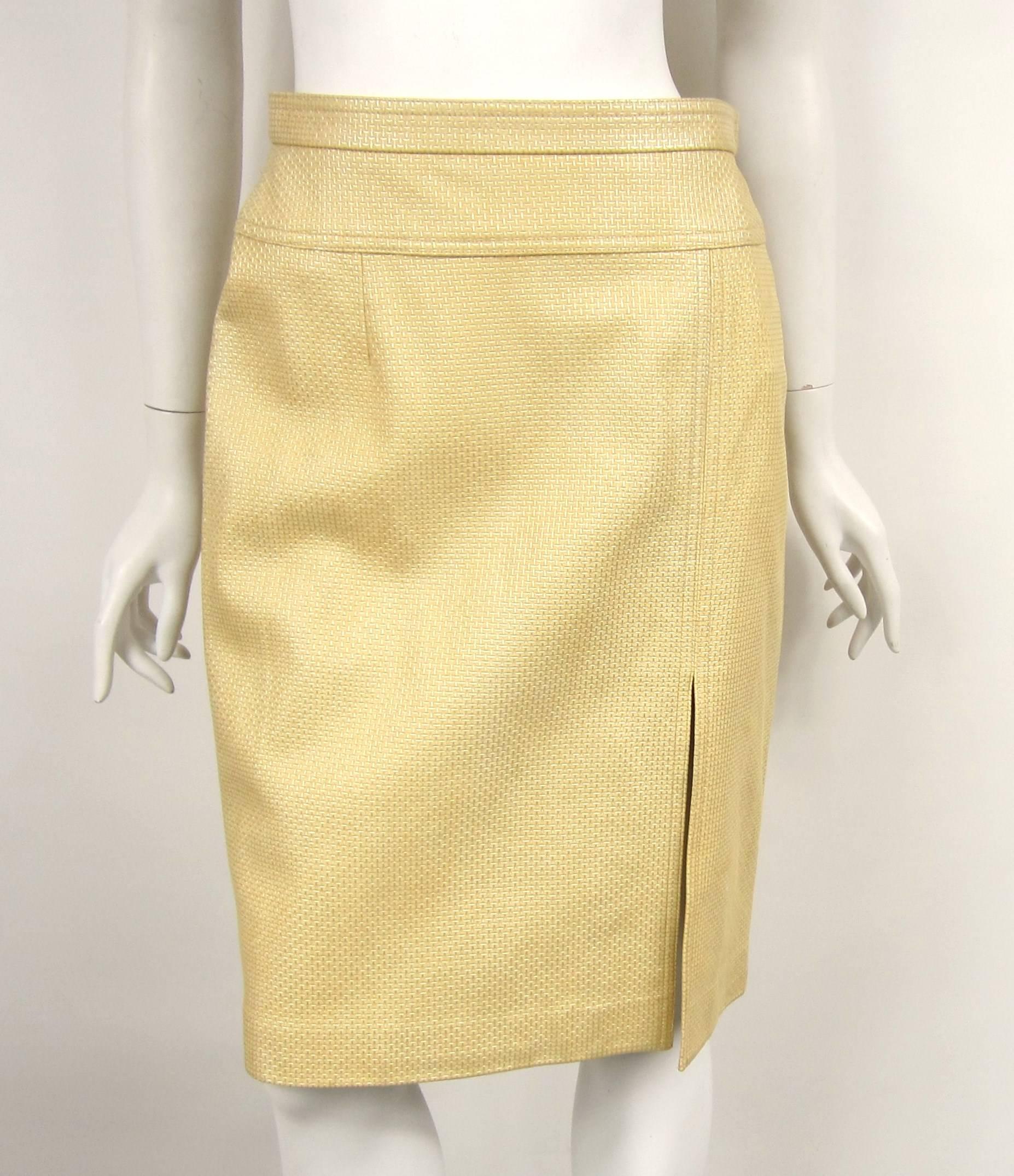 Escada Leather Skirt. The tags still attached, purchased back in the 1990s. Featuring a Side slit and Back zipper - Up to 29
