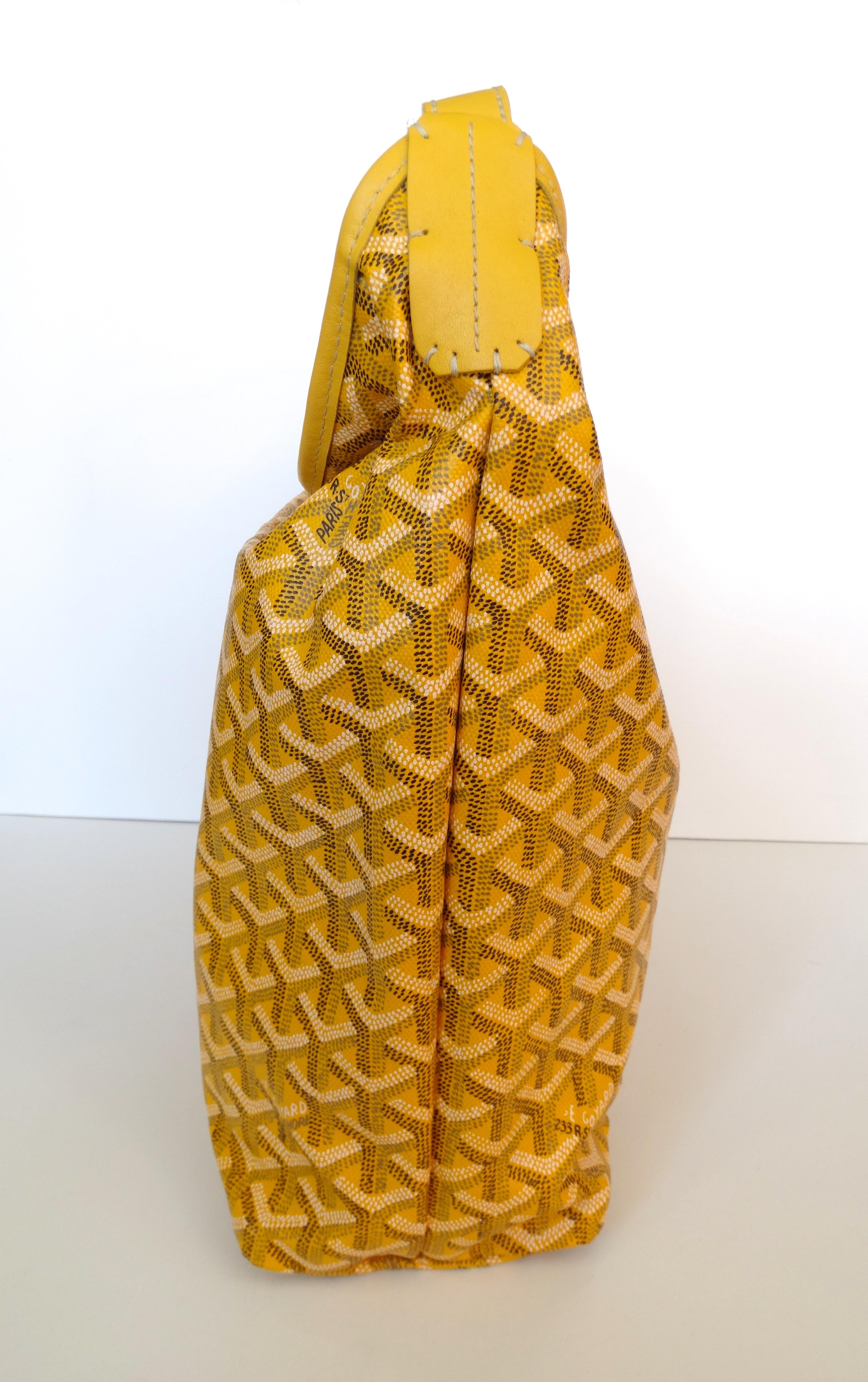 The Perfect Tote Bag For Every Day! Circa 1990s, this particular style is no longer in production, making it the perfect vintage item! This Goyard  Fidji hobo bag features the iconic Goyard monogram all over and is made of yellow cowhide leather.