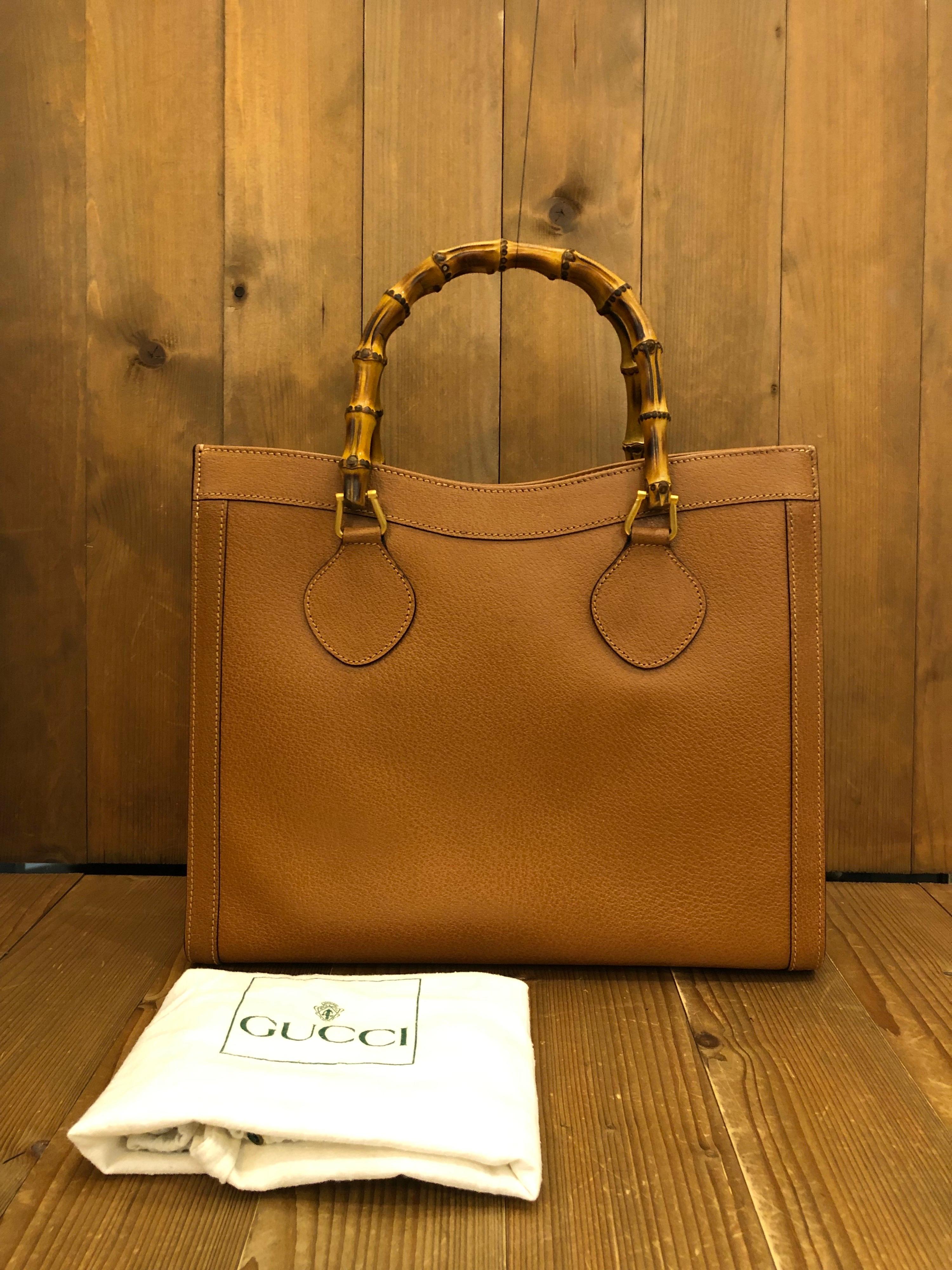 1990s Gucci bamboo tote in tan leather. The Bamboo tote is one of Princess Diana's favorite purses. Gucci revamped this Bamboo tote in 2021 winter collection. Made in Italy. Measures 13 x 11 x 5.5 inches handle drop 5 inches. It features two main