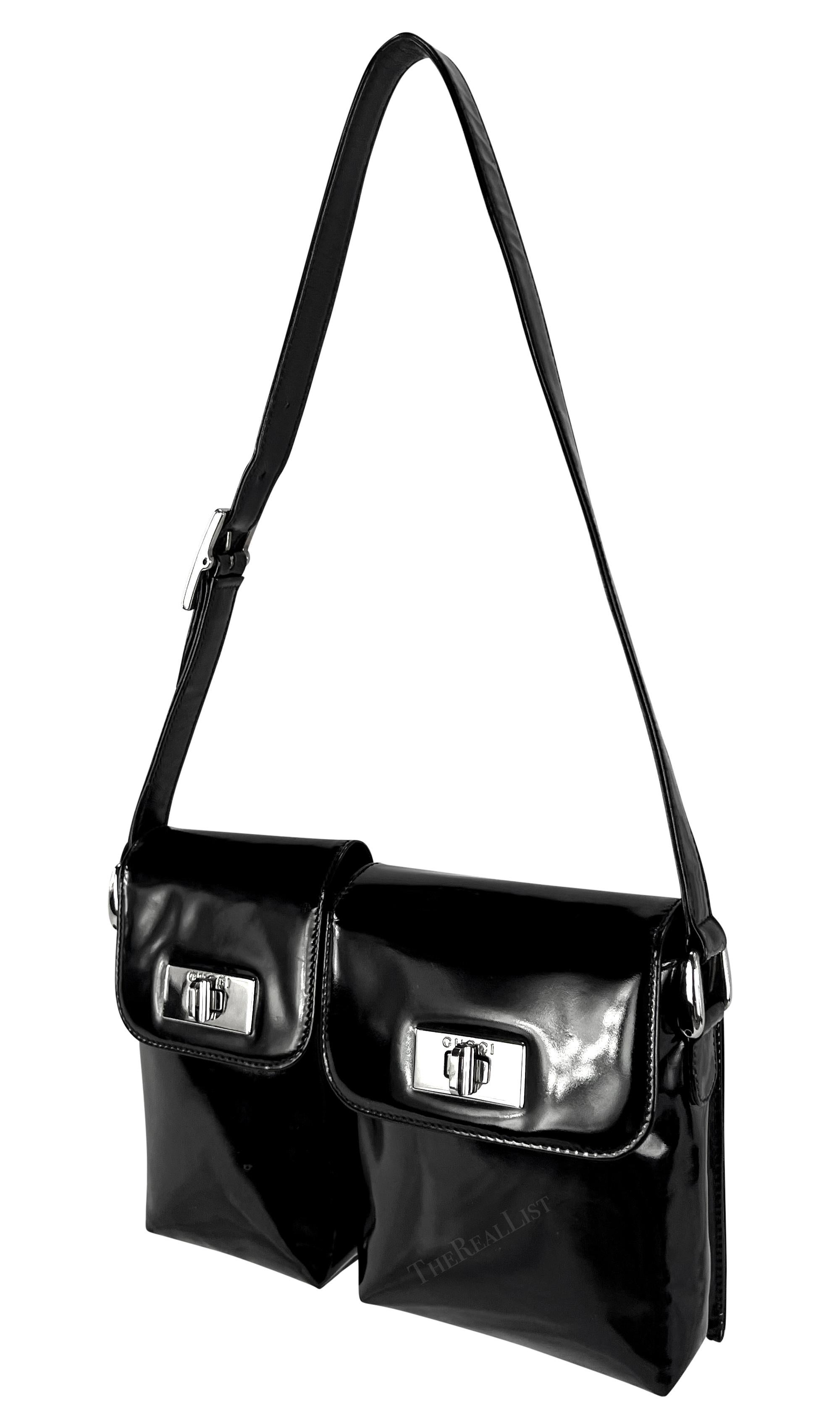 This fabulous black patent leather Gucci shoulder bag, designed by Tom Ford in the mid 1990s, is crafted entirely from glossy patent leather. It features two pouches, each with a silver-plated toggle closure. A sophisticated twist on the classic
