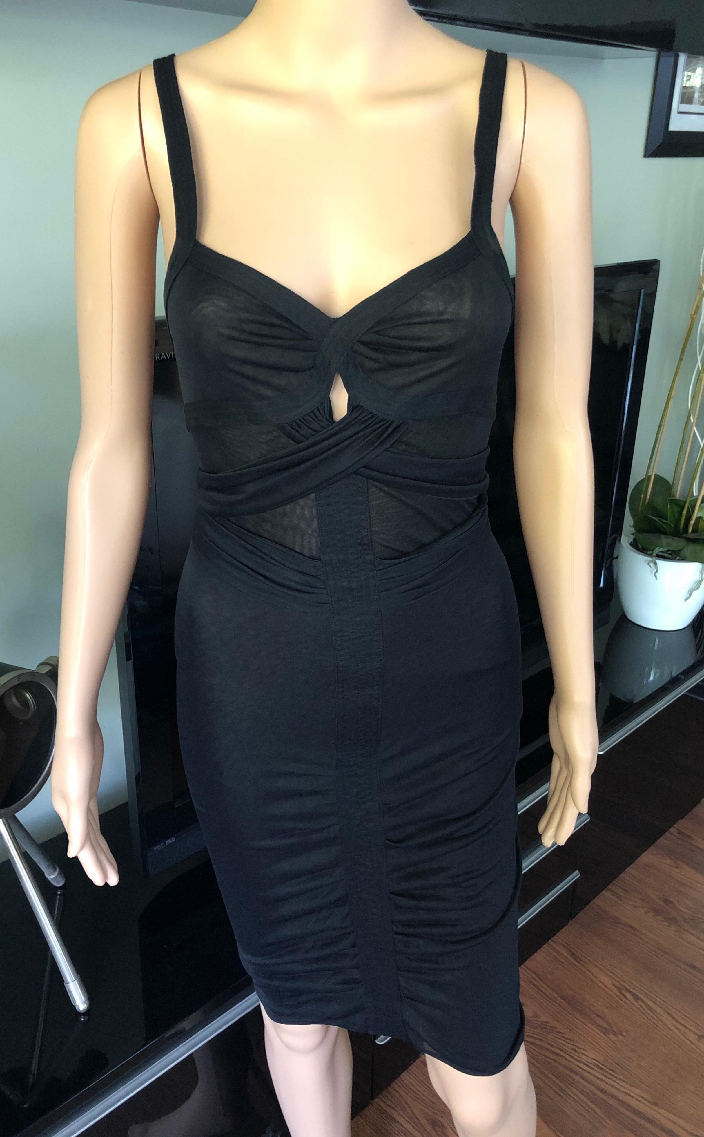 1990'S Gucci by Tom Ford Semi-Sheer Knit Bodycon Black Dress XS

Gucci semi-sheer lightweight stretch knit sleeveless dress featuring crossed accent at front and snap closures at back. 
