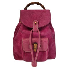 1990s Gucci fucsia pink suede bamboo small backpack