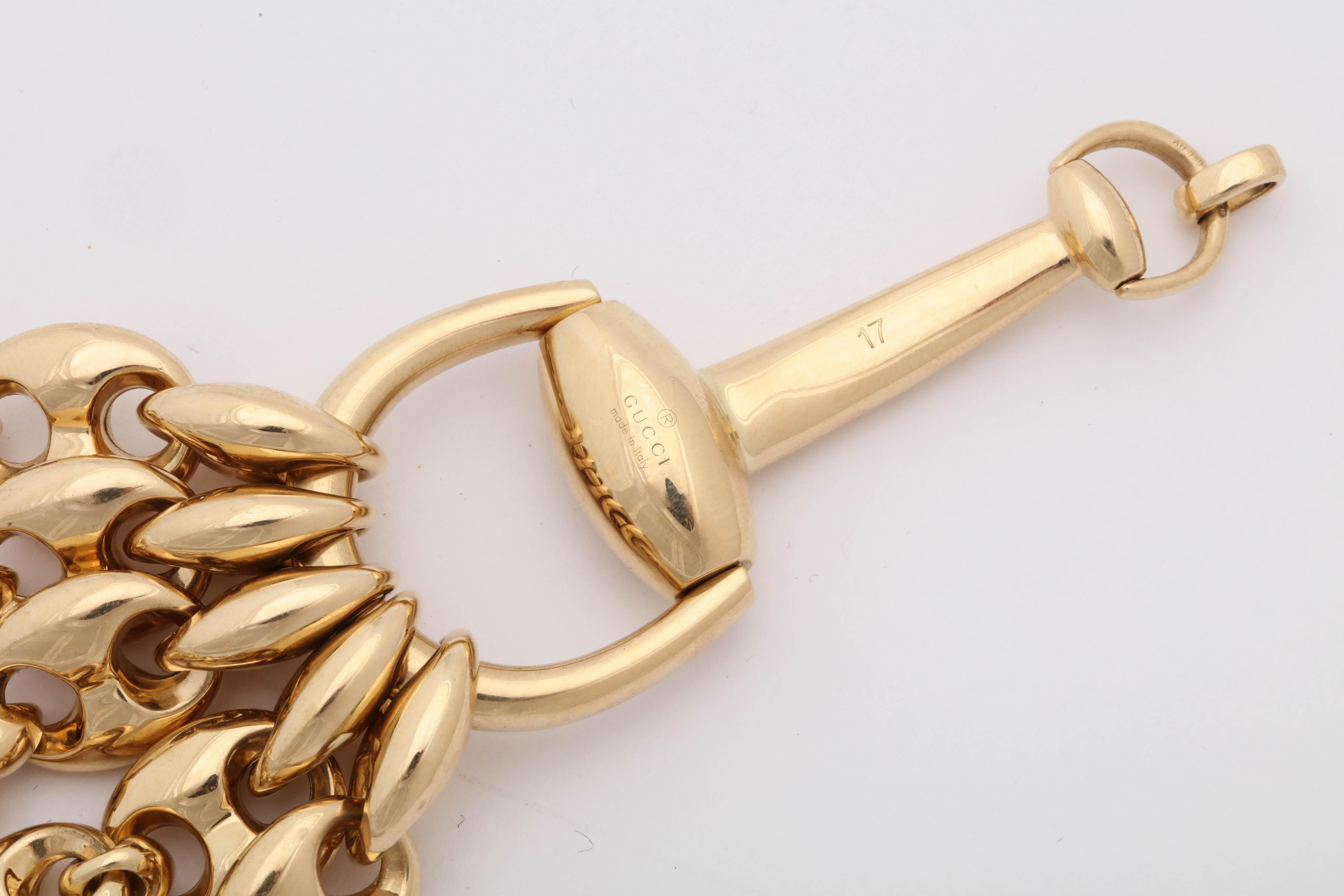 Women's 1990s Gucci Horseshoe Bit and Gucci Link Design Flexible Gold Bracelet