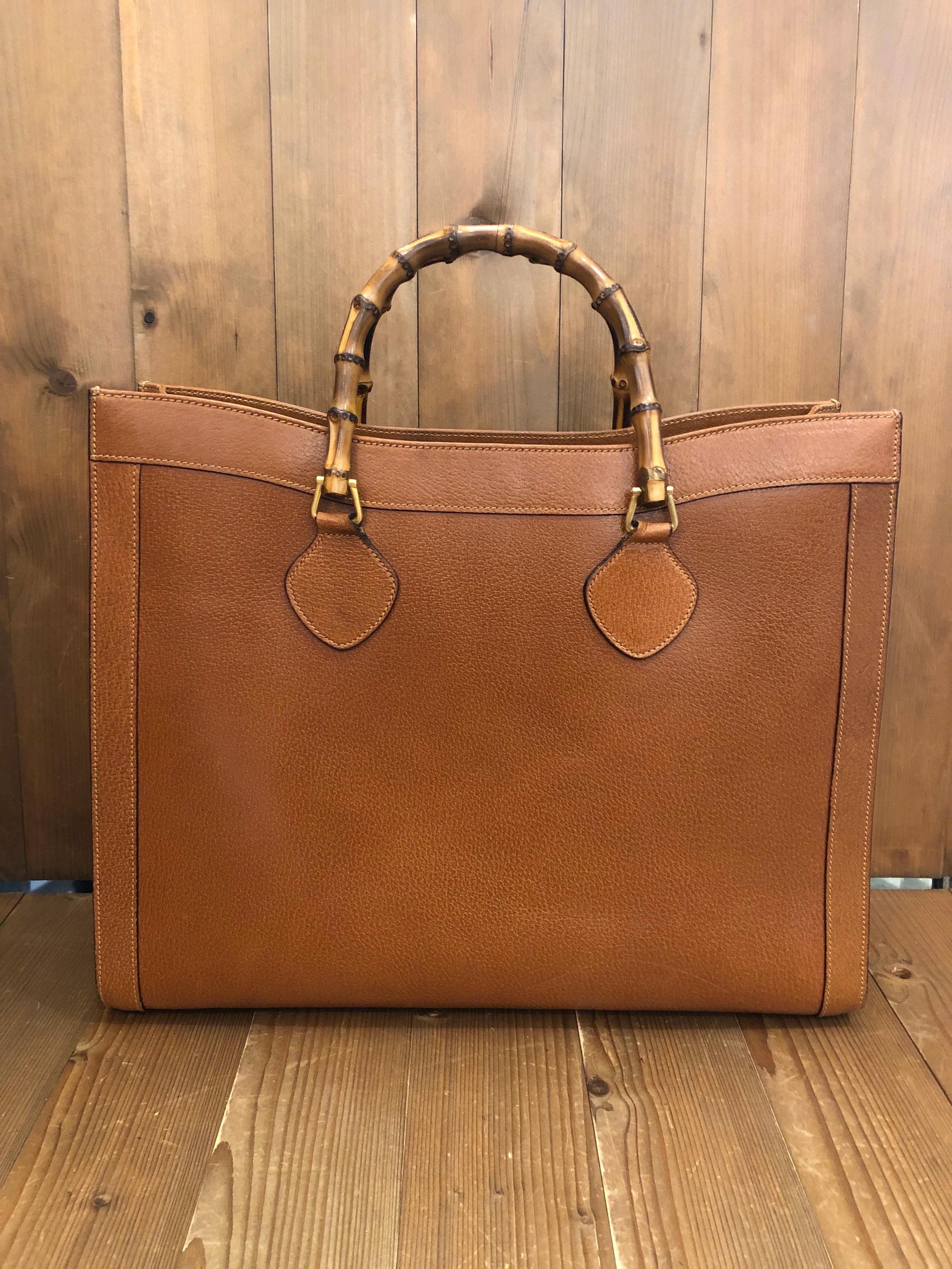 1990s Large sized Gucci bamboo tote in brown leather. The Bamboo tote is one of Princess Diana's favorite purses. Gucci revamped this Bamboo tote in 2021 winter collection. Made in Italy. Measures 17 x 14 x 5.75 inches handle drop 4” (large size).