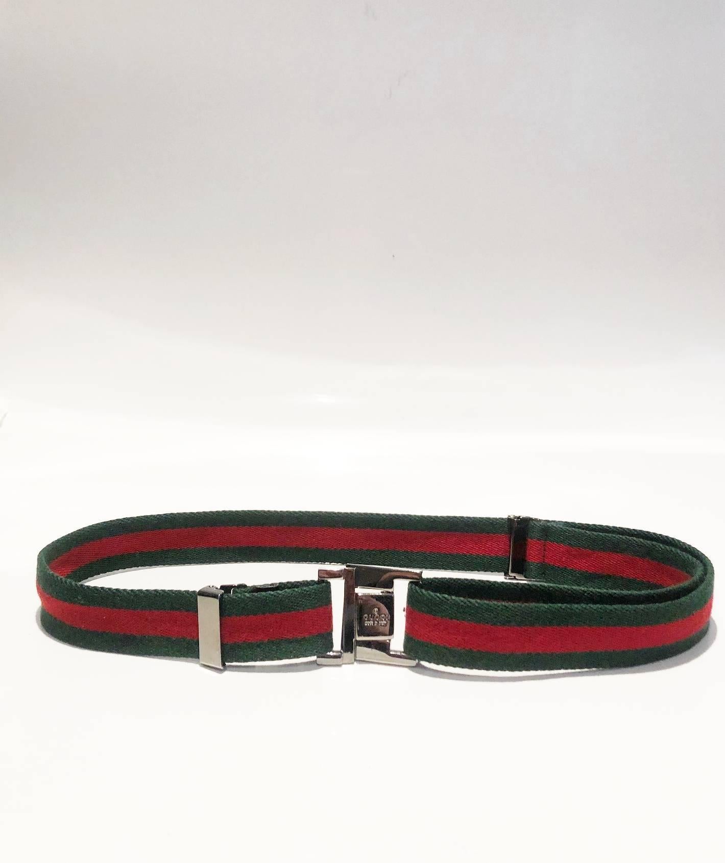 FREE and WORLDWIDE DELIVERY 

Unisex late 1990s web belt from Gucci, green and red web canvas, silver-toned hardware and buckle, adjustable slider, Made in Italy

Condition: vintage, very good, consistent with age
Measurements: 87x 4cm - max length