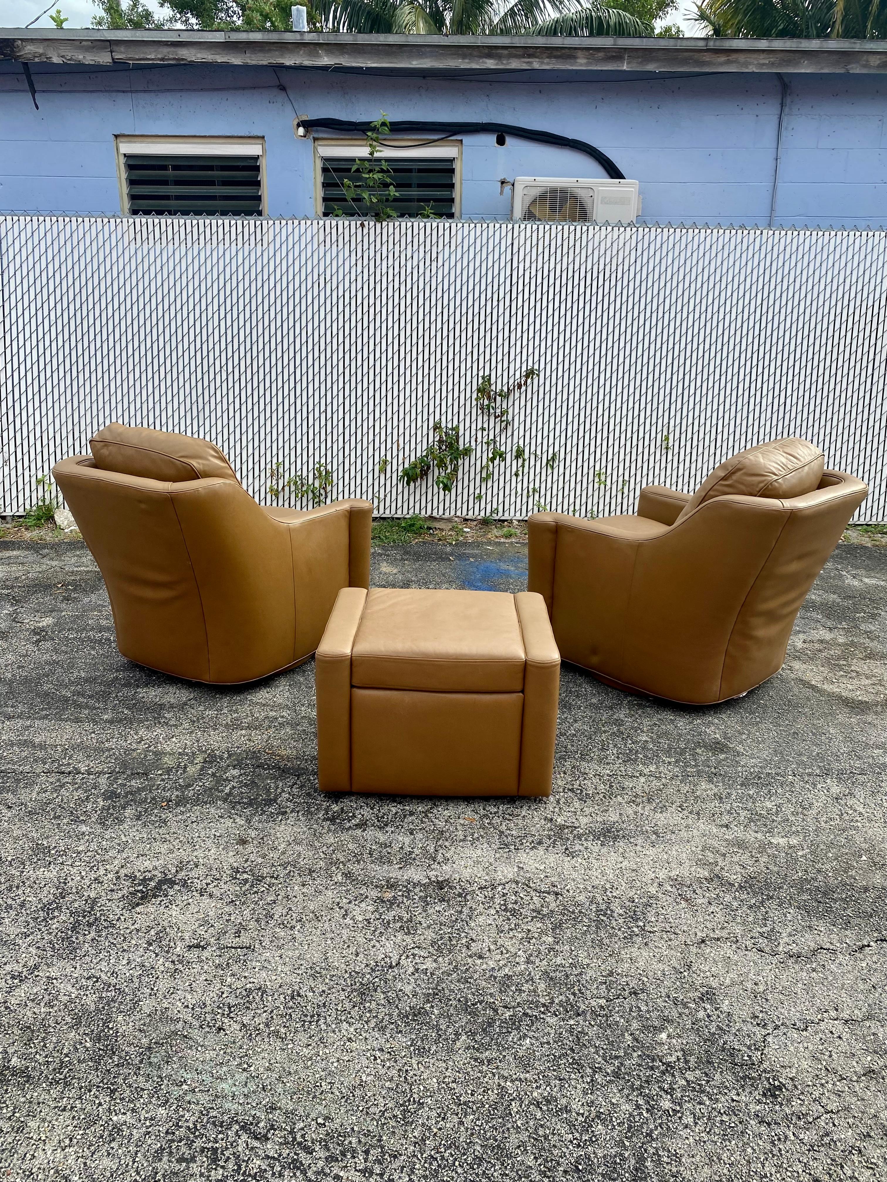 1990s Hancock & Moore Leather Swivel Chairs and Ottoman, Set of 3 In Good Condition For Sale In Fort Lauderdale, FL
