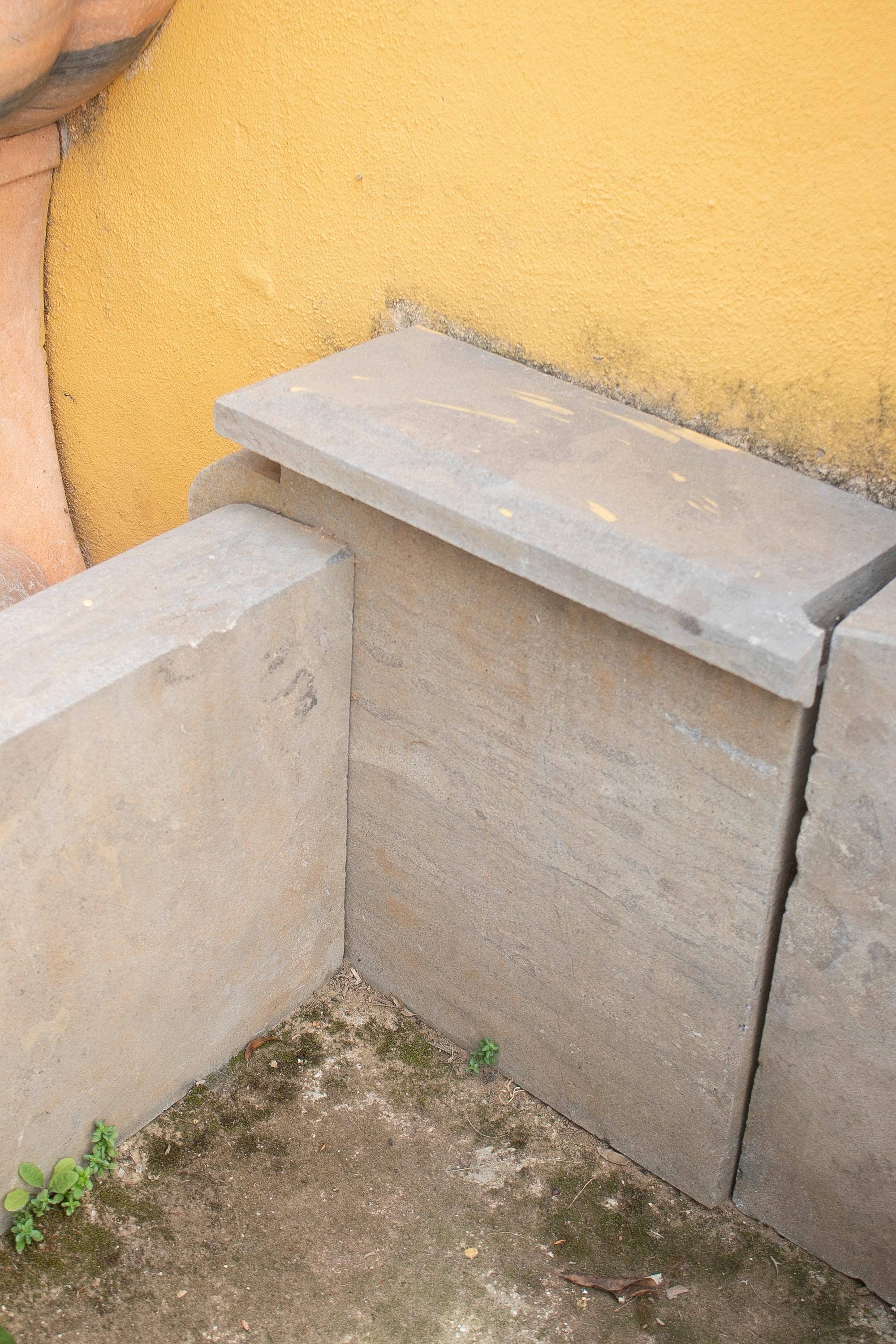 Late 20th Century 1990s Hand Carved Aged Stone Antique Reproduction Wall Fountain For Sale