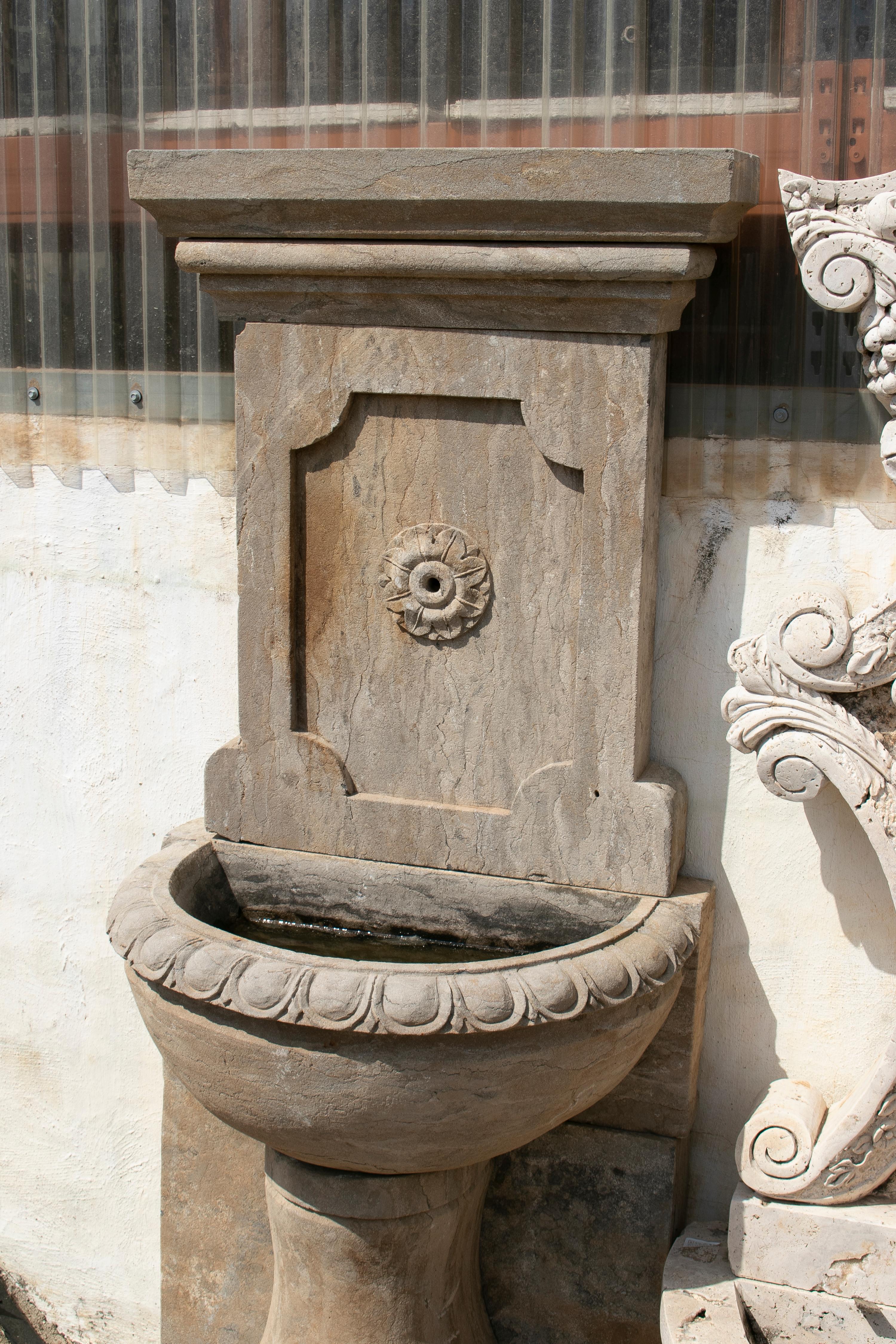 European 1990s Hand Carved Aged Stone Wall Fountain