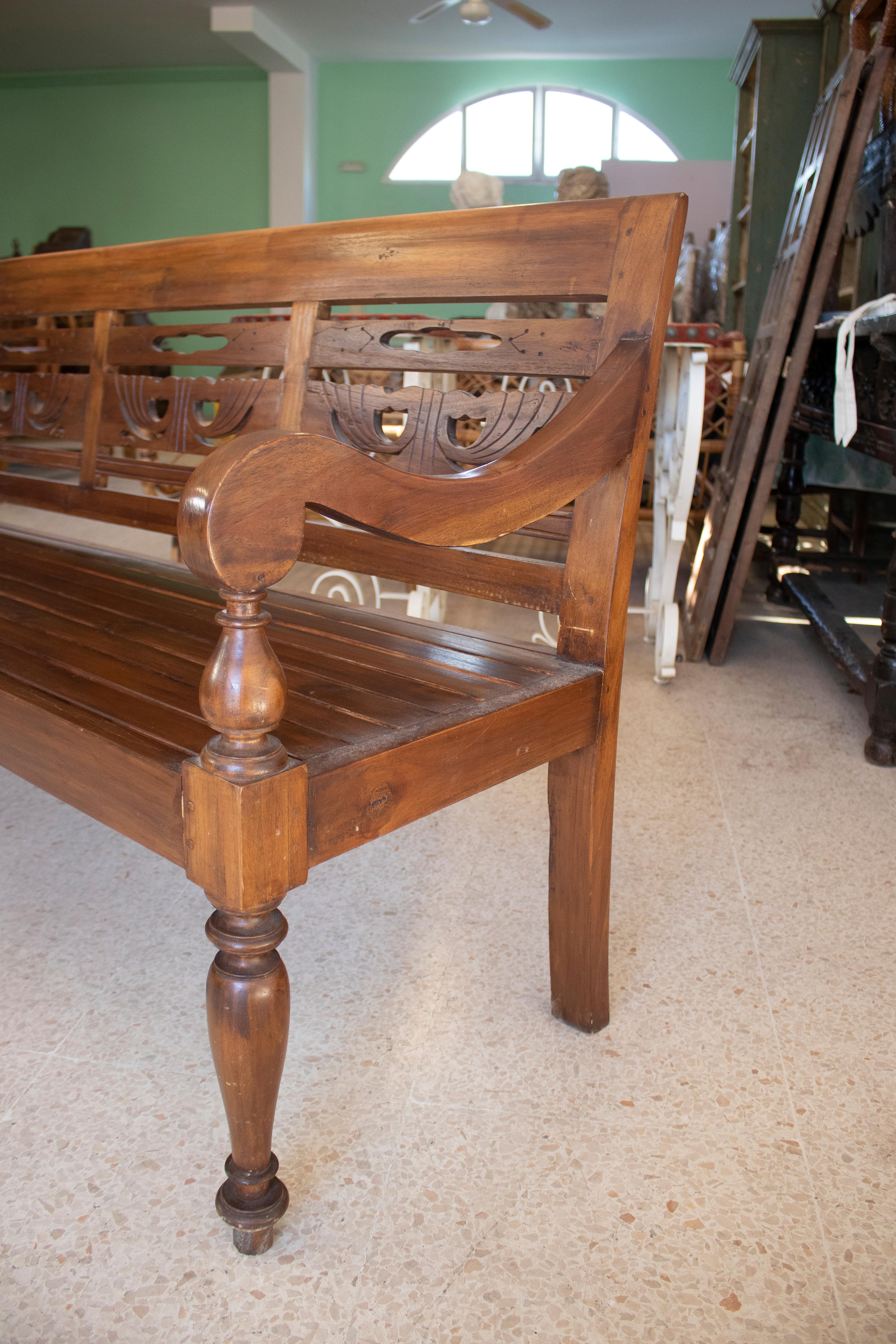 carved wooden bench