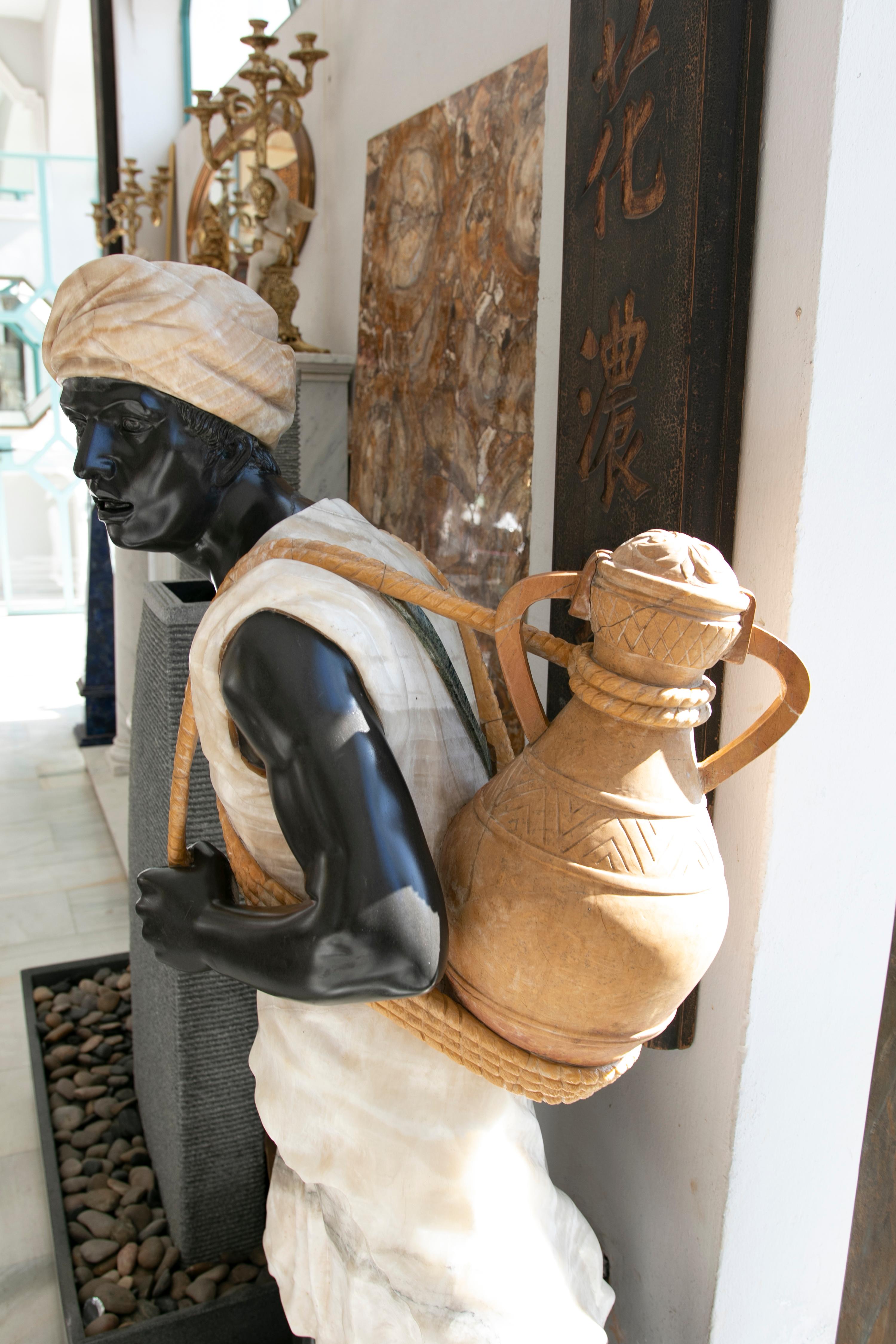 Spanish 1990s Hand Carved Onyx and Marble Sculpture of a Water-Carrier Character For Sale