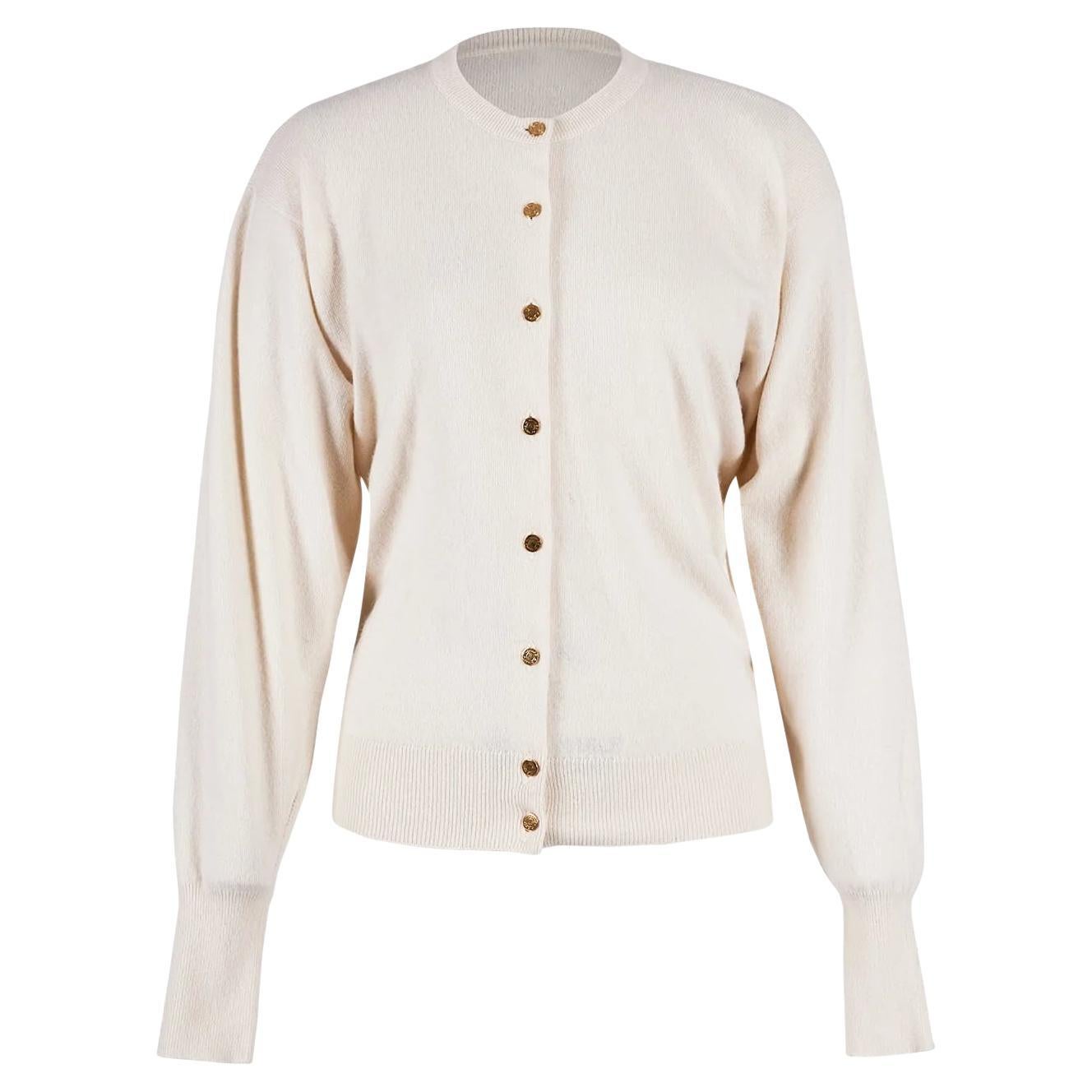 cream cardigan with gold buttons
