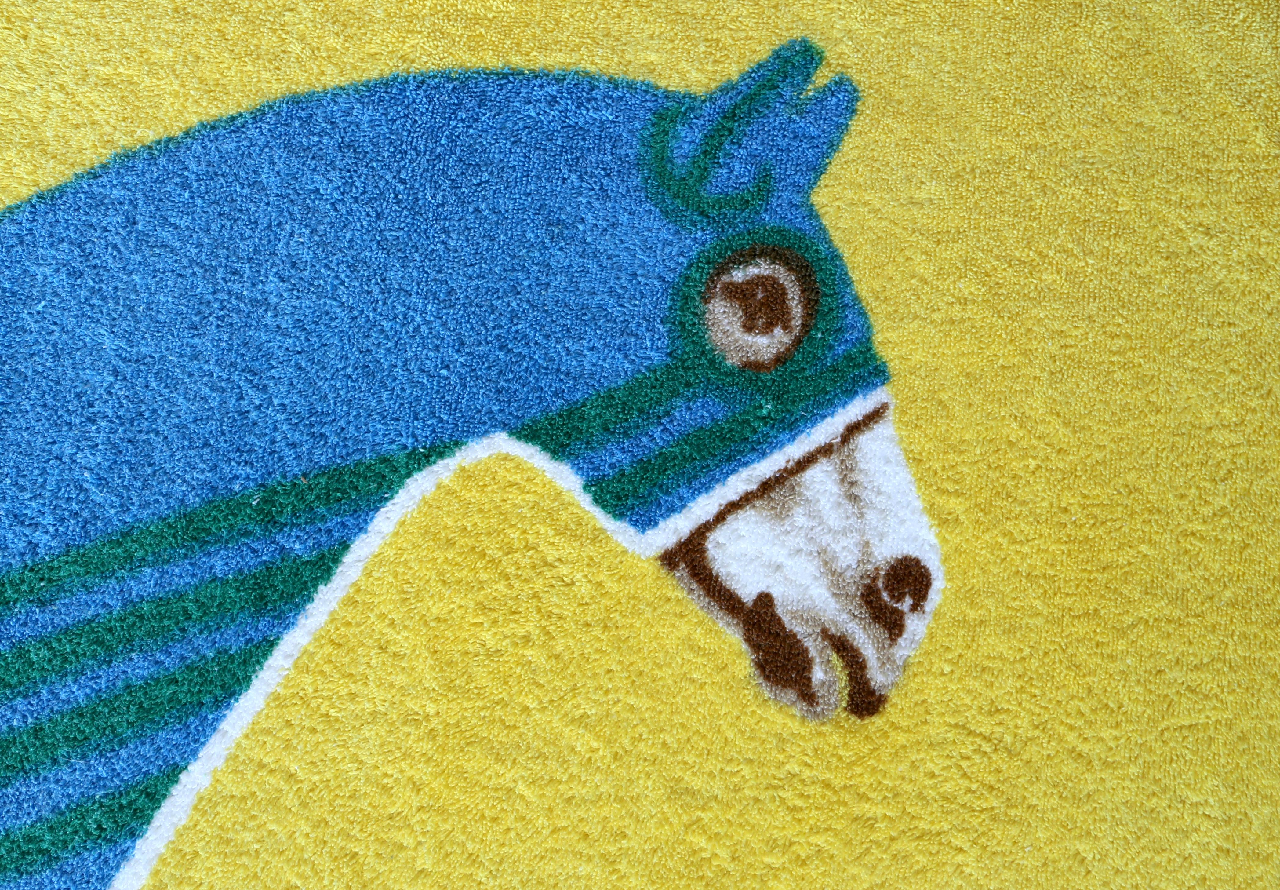 Very rare, yellow and blue equestrian themed beach towel by Hermes dating to 1990's. Towel measures approximately: 56