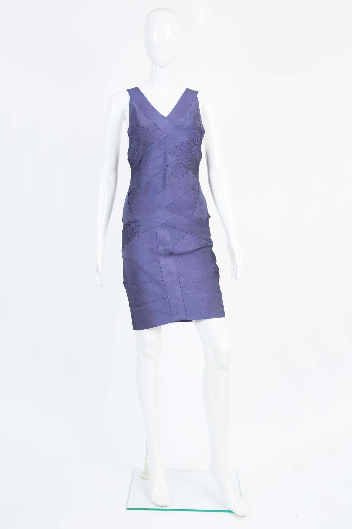 1990s Herve Leger purple knitted bandage dress featuring a short length, pleats on the body, front bands yokes details, a center back zip on a brown band. 
Composition :90% rayon, 9% nylon, 1% lycra
Size labe:l L
Unworn, with tag attached In