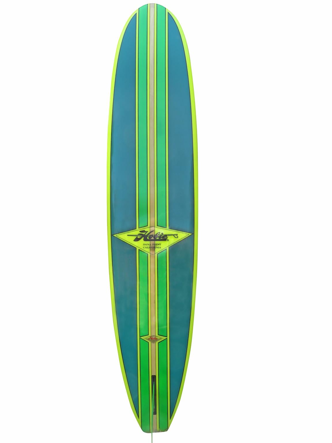 Mid-1990s vintage Hobie Phil Edwards model longboard surfboard shaped by Phil Edwards. Featuring a custom airbrush design with T-band stringer and box single fin. This surfboard is in great all original condition and has never been surfed!

Phil
