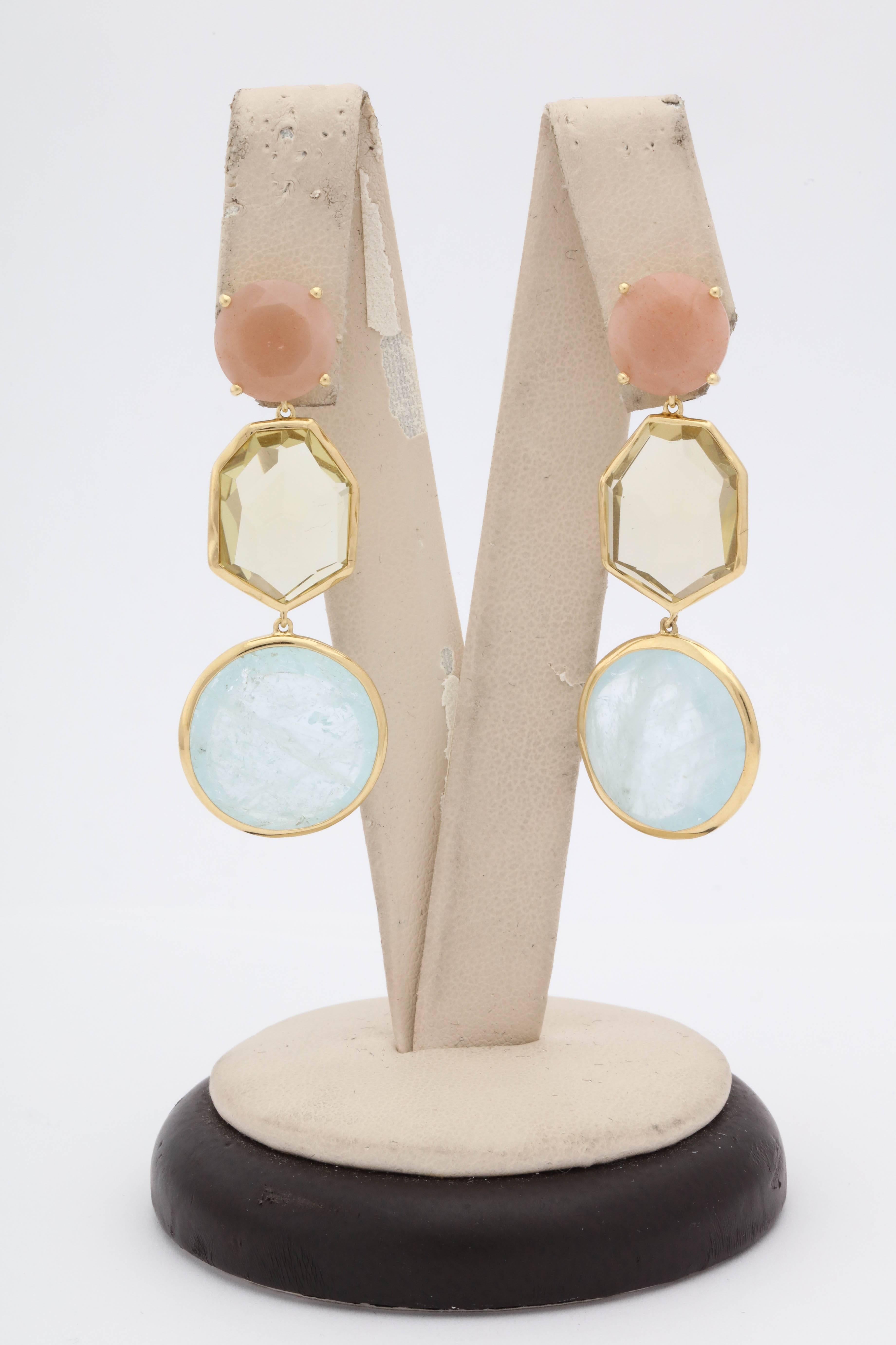 One Pair Of Ladies 18kt Yellow Gold Flexible Dangle Earrings Embellished With Two Prong Set Pastel Color Faceted Rose Quartz Stones And With Two Octangular Shaped Bezel Set Citrine Stones. Further Designed With Two Cabochon Pastel Color Bezel Set