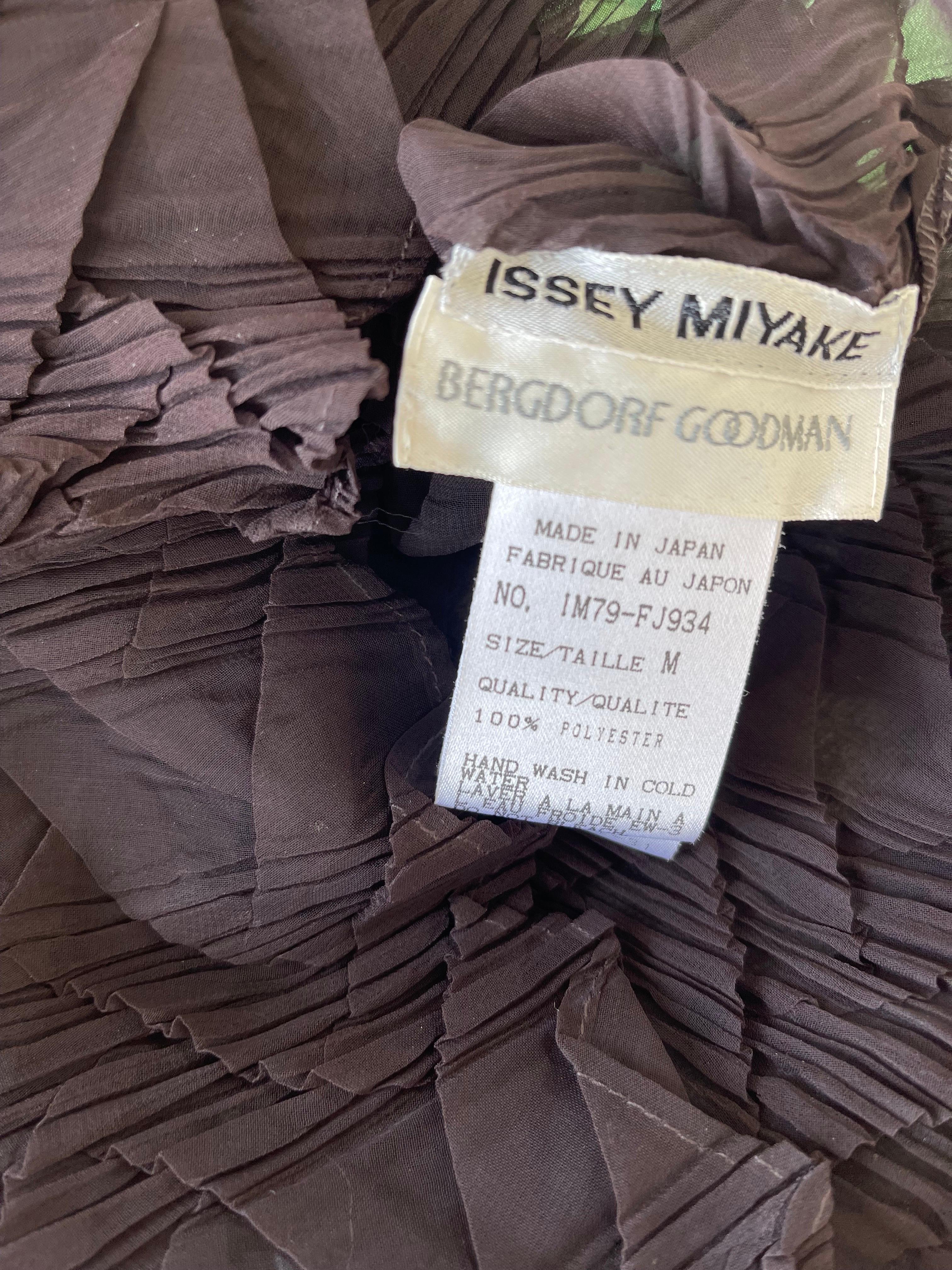 Chic vintage 90s Issey Miyake for Bergdorf Goodman chocolate brown sheer pleated shirt ! Buttons up the front (but, can be reversed to button up the back). Unique crinkle pleats throughout. Packs easy, and does not wrinkle. Can easily be dressed up