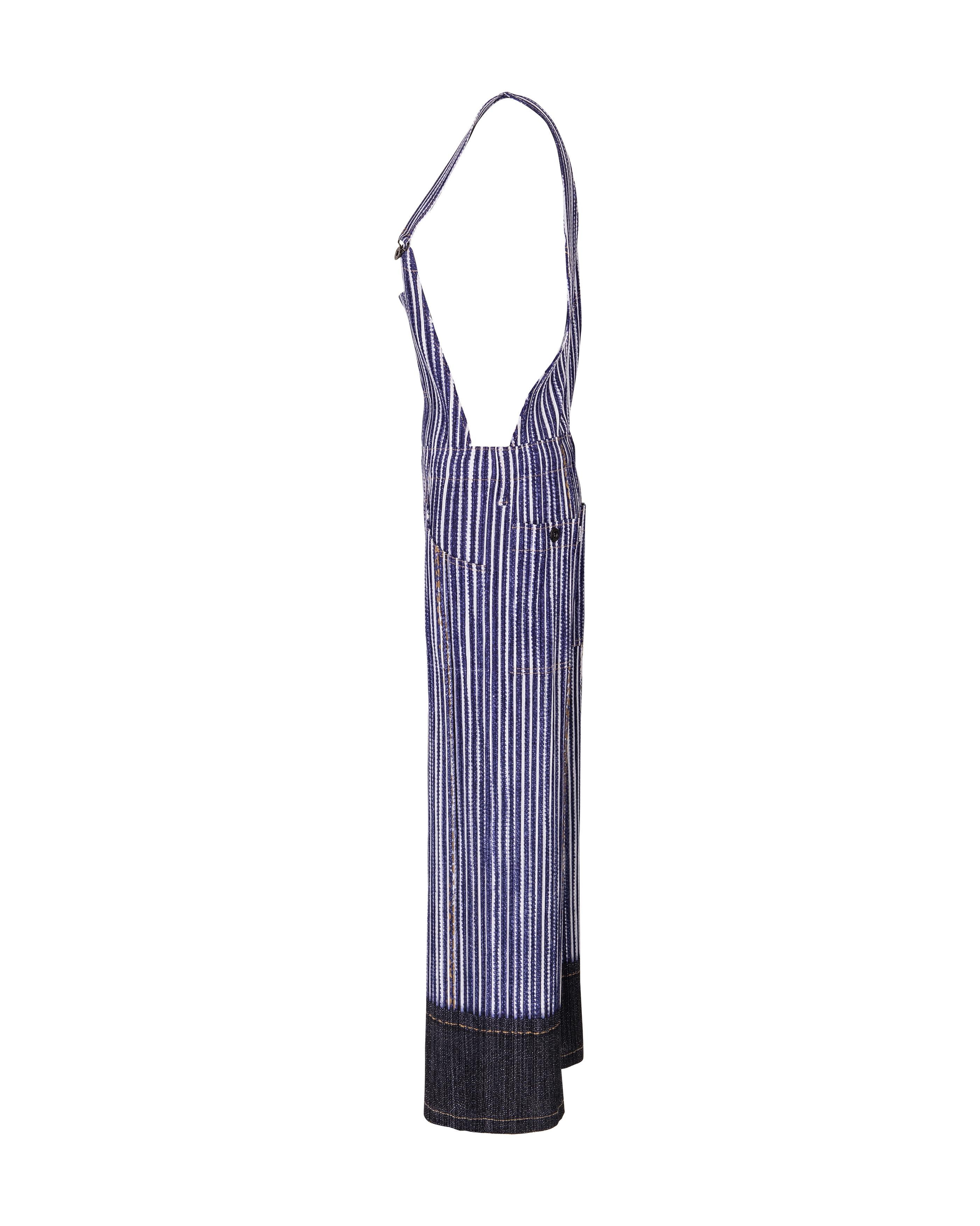 1990's Issey Miyake 'Pleats Please' pleated blue and white overalls. Blue and white contrast pleated stripes throughout with stamped Pleats Please silver tone buttons. Contrast yellow stitching, front and side pockets, and darker blue contrast