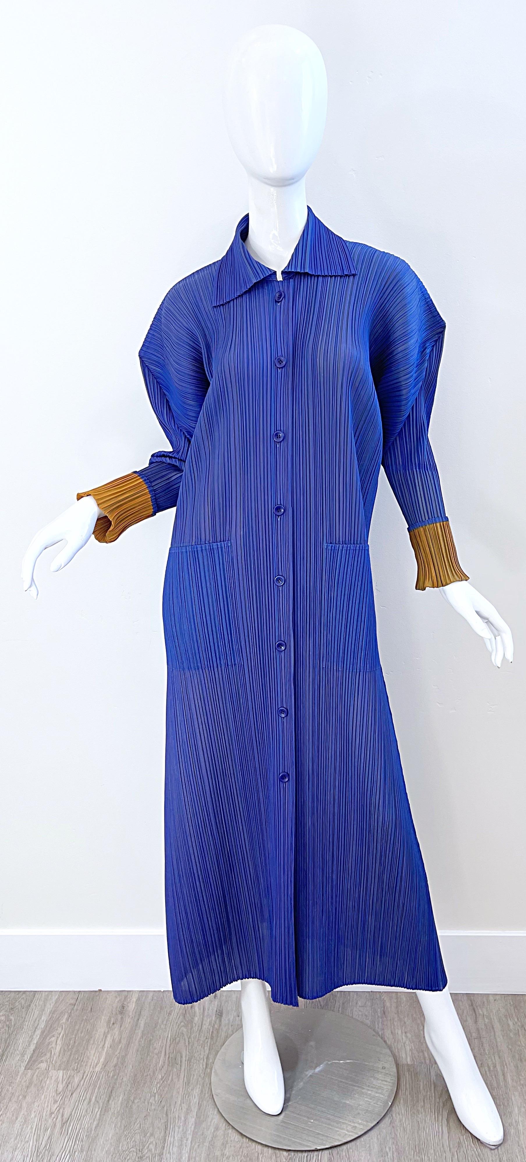 Avant Garde ISSEY MIYAKE Pleats Please blue and marigold pleated duster jacket / long cardigan. Signature Miyake pleats that are so easy to wear. Intricate architecture shoulders. Pockets at each side of the hips. Buttons up the front. Marigold