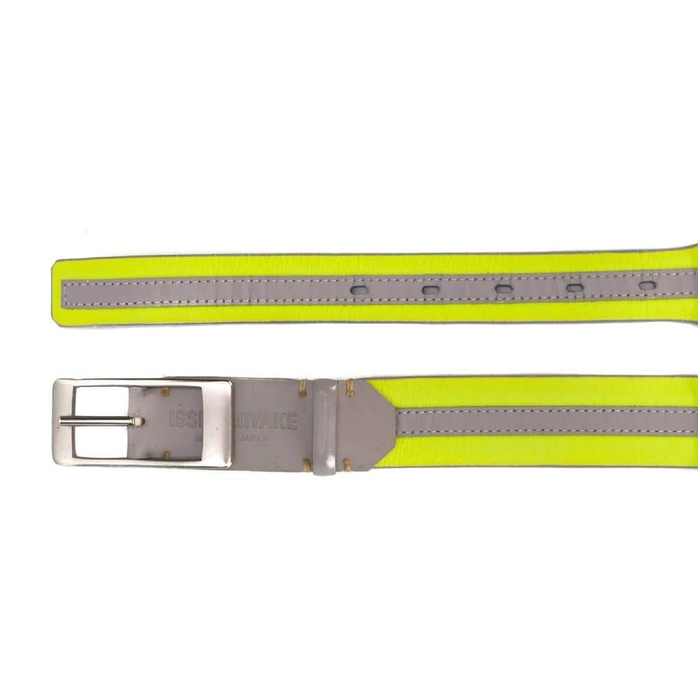 Issey Miyake leather belt with fluorescent yellow and gray side bands. Buckle in silver metal.
Years: 90s

Made in Japan

Length: 100 cm
Width: 3 cm

