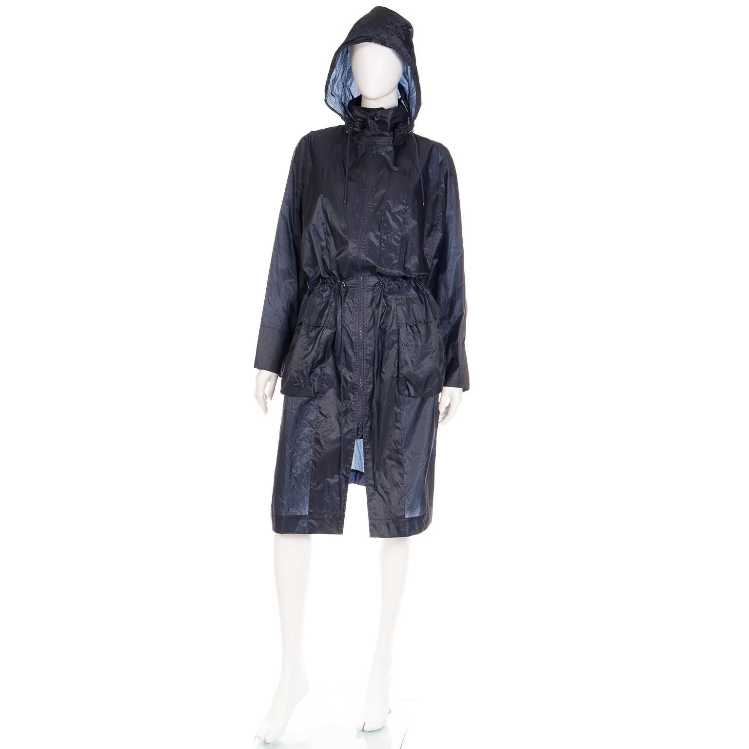 This vintage Issey Miyake 1990's nylon windcoat is one of the designer's signature pieces. His now iconic raincoats were so popular that he created the windcoat line. These billowing oversized raincoats were famously photographed in 1987 by Irving