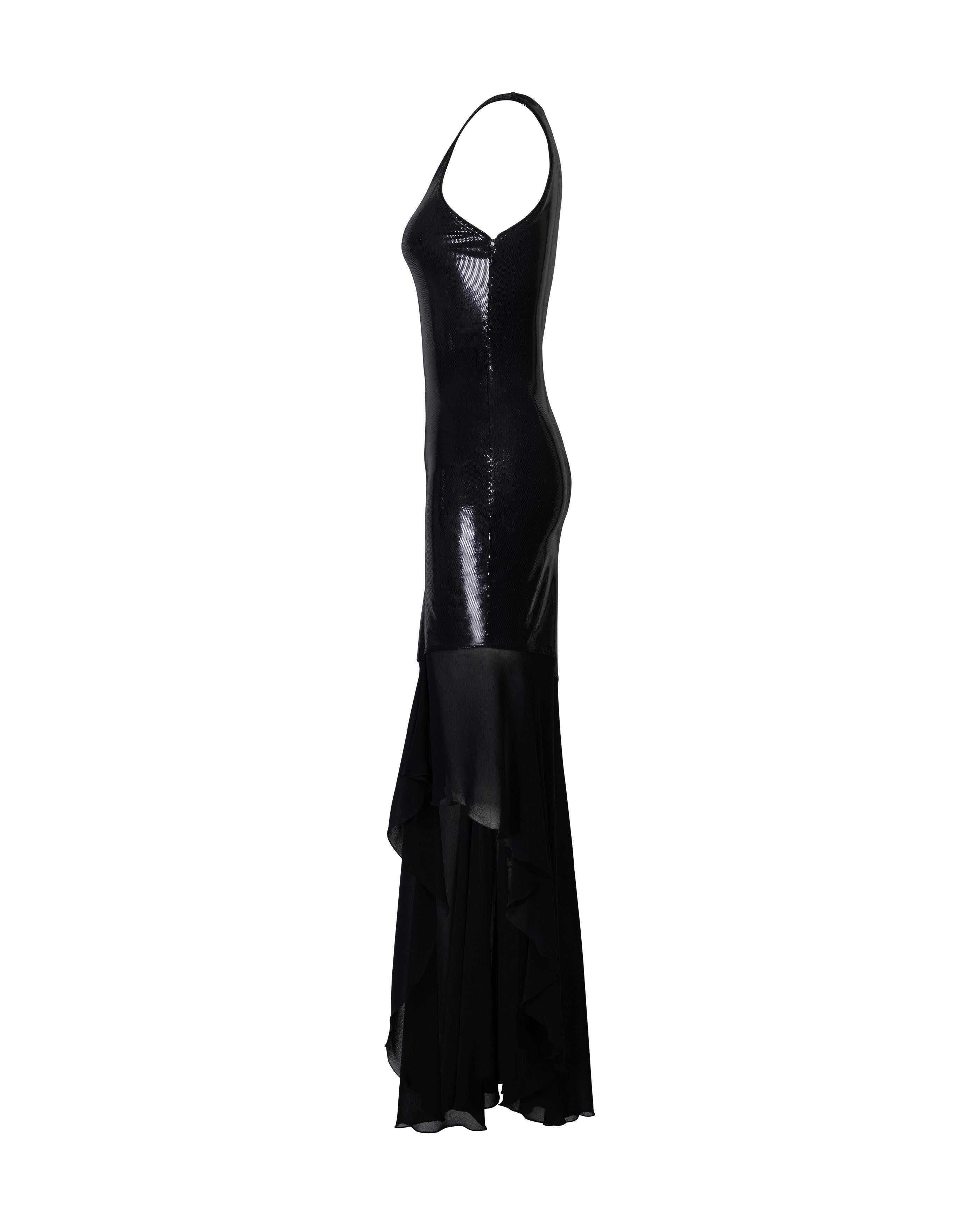 1990's Istante by Versace metallic black faux snakeskin gown with semi-sheer silk chiffon asymmetrical hemline. Sleeveless v-neck fitted stretch jersey gown (moderate stretch) with silver-black faux snakeskin pattern throughout. Concealed side zip