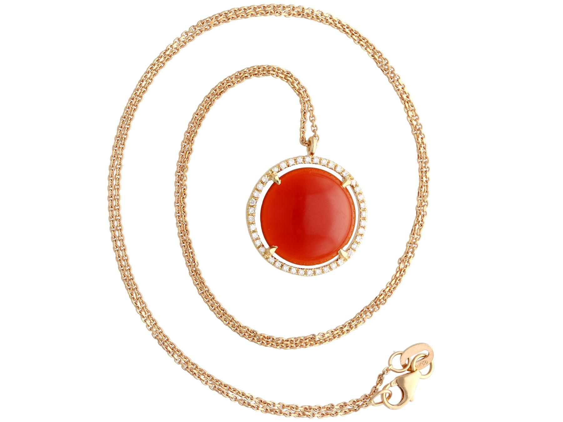 A fine and impressive vintage Italian 4.62 Carat carnelian and 0.25 Carat diamond, 18 karat rose gold pendant; part of our diverse vintage jewelry and estate jewelry collections.

This fine and impressive vintage pendant has been crafted in 18k rose