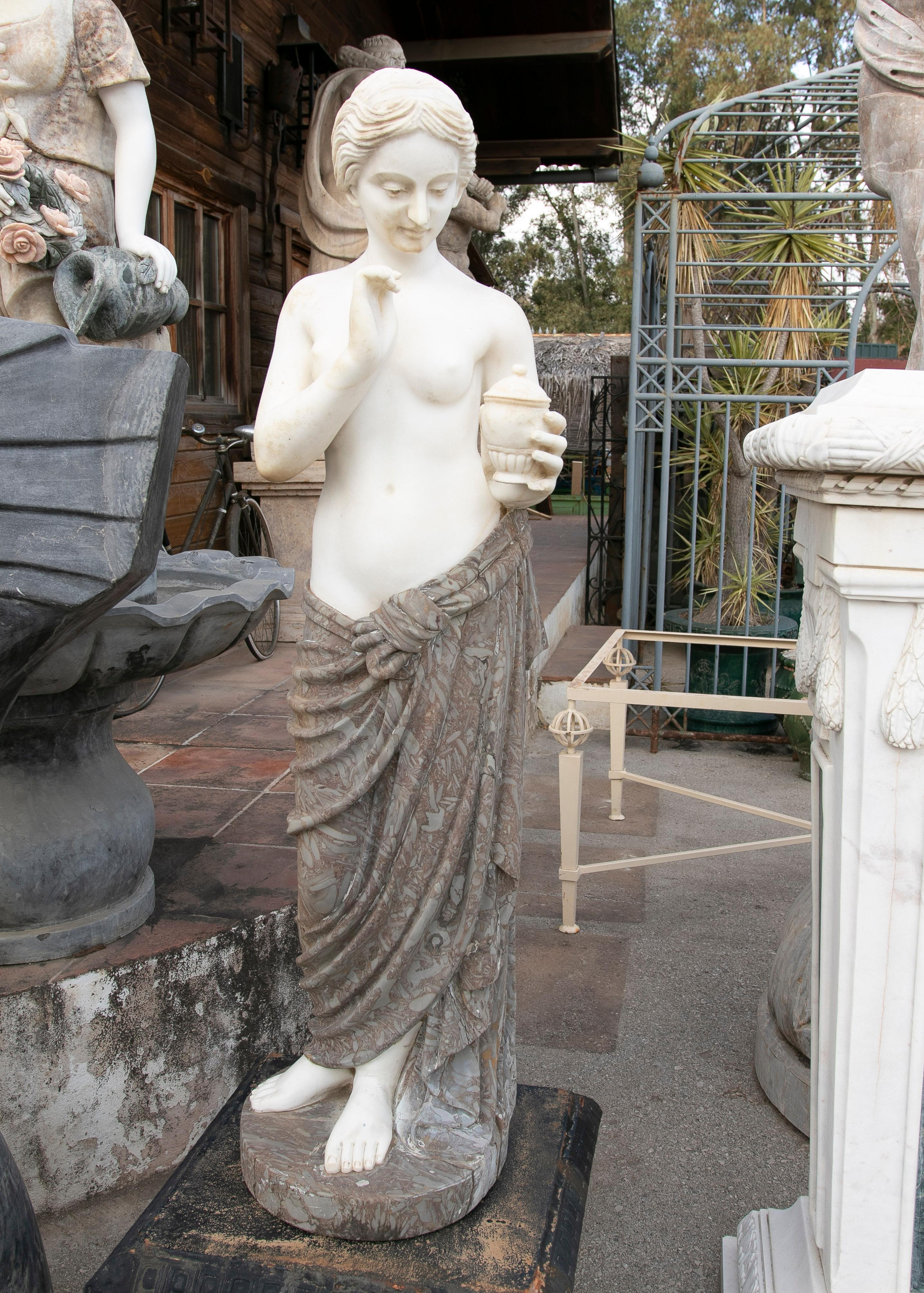 Classical 1990s Italian hand carved Carrara white and brown marble Greek style Venus woman sculpture.