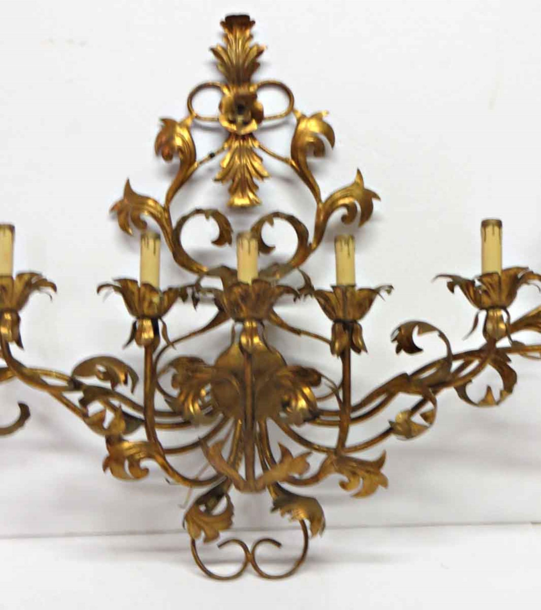 1990s Italian style large 9-light sconce with a decorative scroll and floral leaf design with a center top flower and a gilded gold finish.