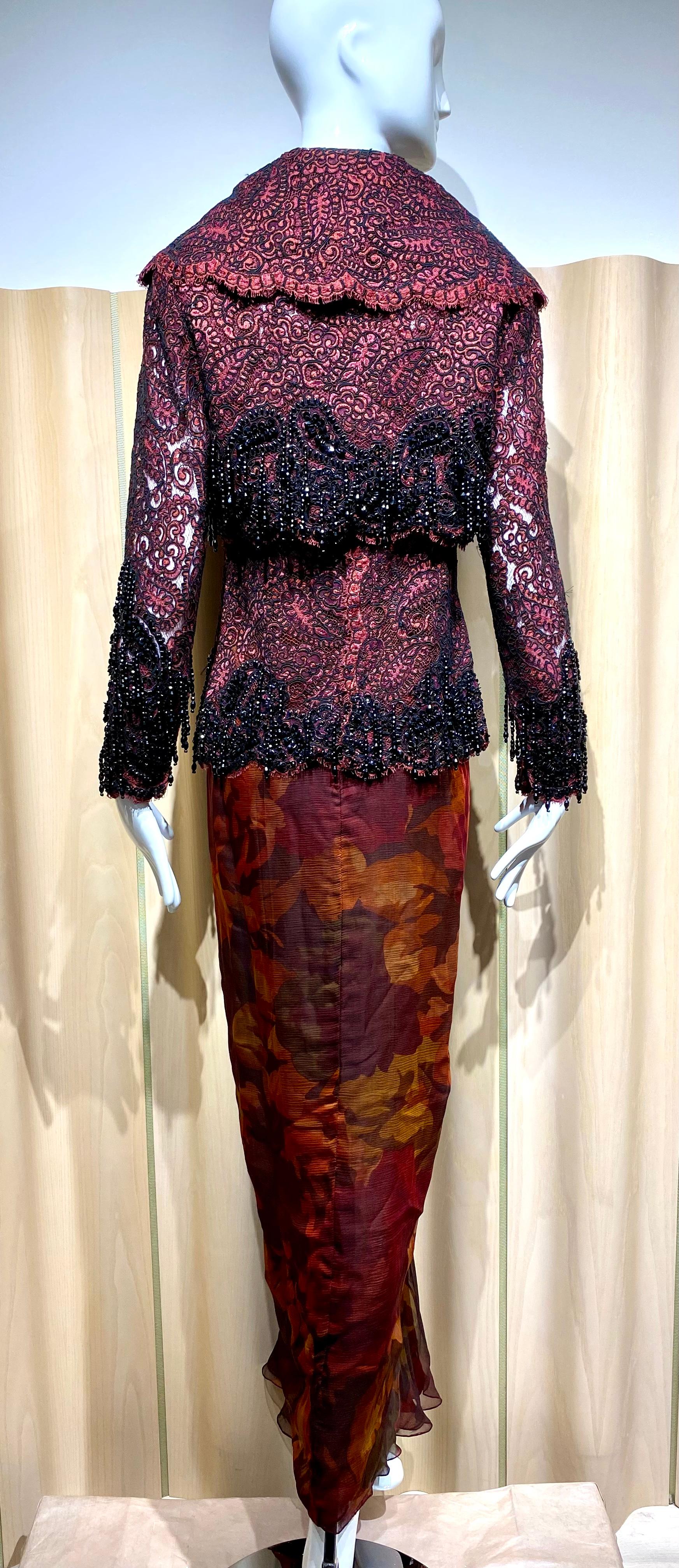 Beautiful 1990s Vintage James Galanos Couture reddish purple lace crop jacket embroidered with black beads.
This there piece comes with spaghetti straps lace blouse and silk chiffon skirt
Size: Small 
Jacket Bust: 34”
Skirt Waist: 25”