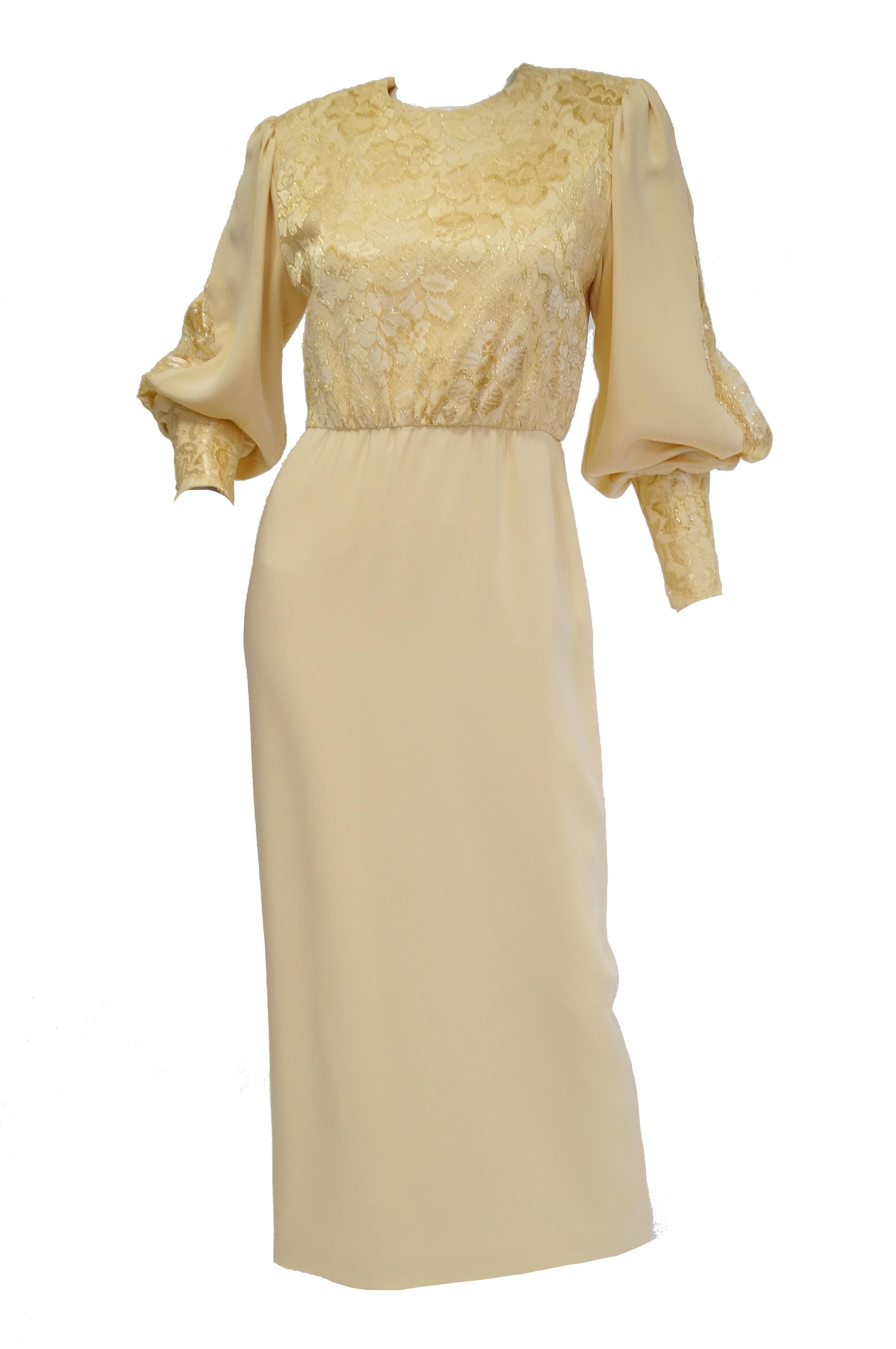 A dreamy ivory/cream evening dress of couture quality design and execution. The dress is maxi length, with long sleeves, an A - line silhouette, and a somewhat loose bodice. The bodice is entirely covered in intricate floral lace, and has a high