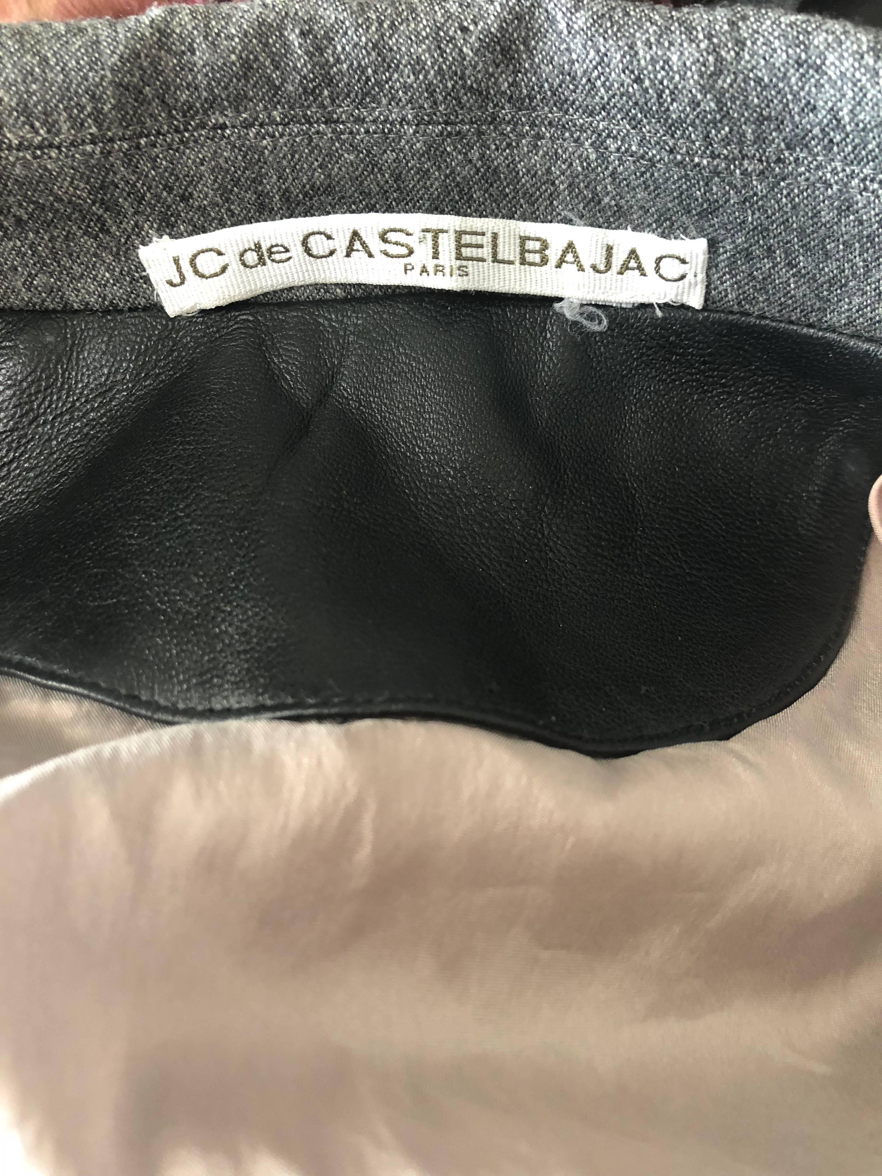 Chic 1990s 90s JEAN CHARLES DE CASTELBAJAC grey and black virgin wool and leather double breasted smoking blazer jacket! Soft gray color, with black leather panels on the back. Features oversized lapels. Pockets at each side of the waist. Fully