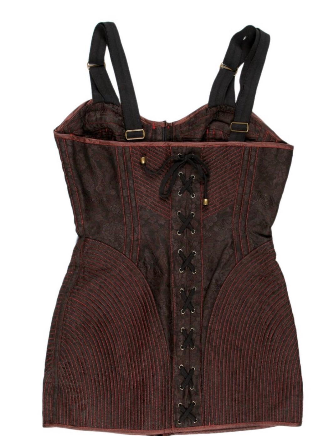 Jean Paul Gaultier maroon and black floral mini dress with lace up back and hook eye front and quiltiing. Condition: Excellent. 
Size S/ US 4
28