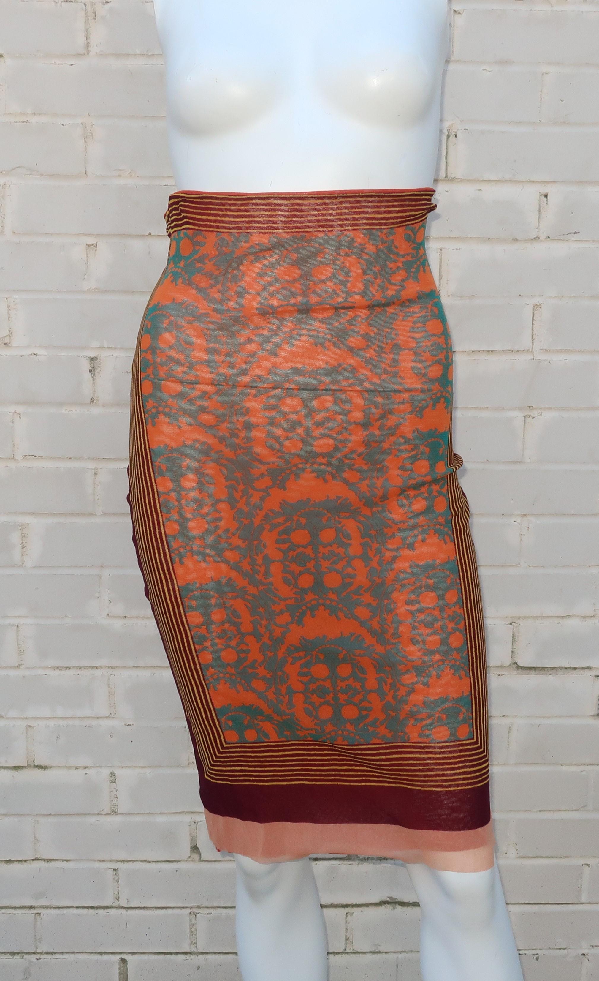Jean Paul Gaultier’s ‘Les Tatouages‘ collection from the 1990’s was inspired by tribal motifs and a certain boho chic that combined cultural references for fashionable effect.  This stretchy nylon mesh semi-sheer skirt features a graphic design