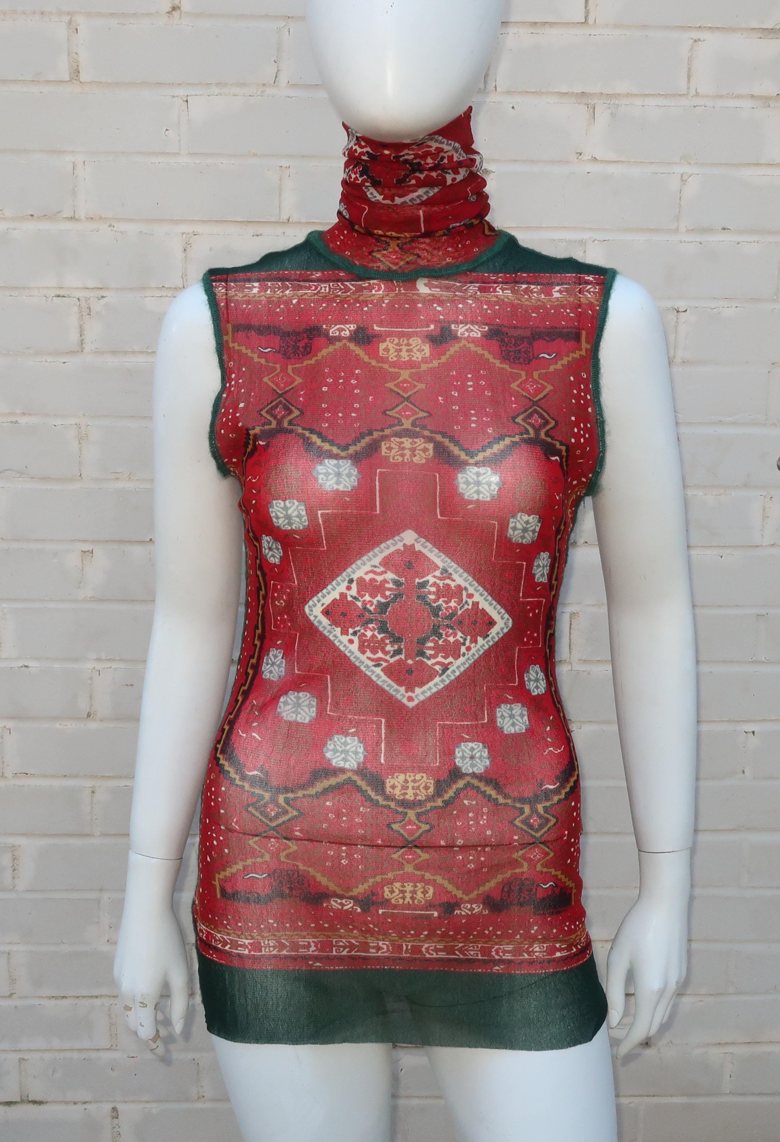 Jean Paul Gaultier’s ‘Les Tatouages‘ collection from the 1990’s was inspired by tribal motifs and a certain boho chic that combined cultural references for fashionable effect.  This stretchy nylon mesh semi-sheer top features a geometric design