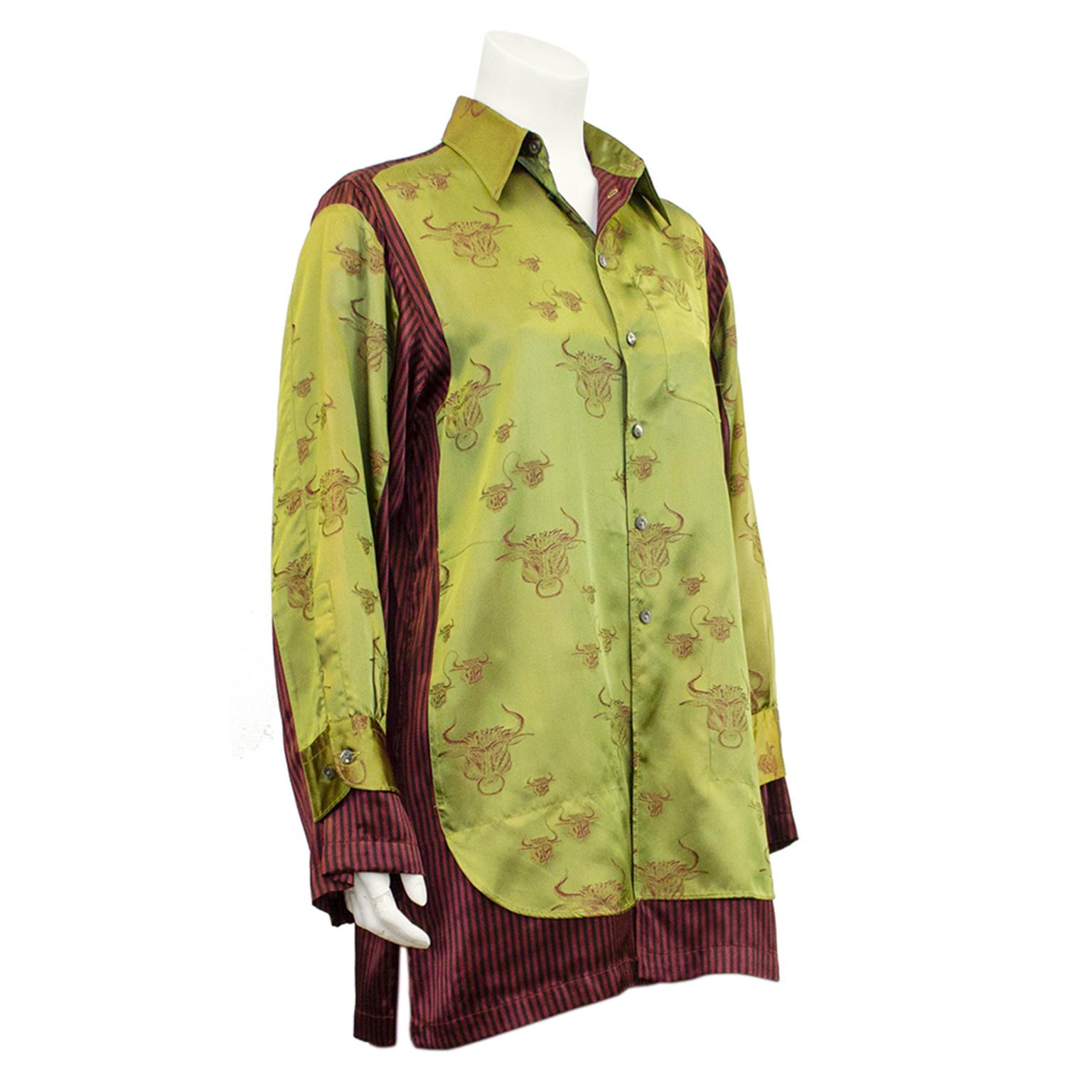 1990s fabulous Jean Paul Gaultier Femme pyjama style oversized shirt with olive green silk jacquard with an all over print of oxblood Spanish bulls. Contrasting red and black vertical striped silk trims the shirt.  Size IT 40. Excellent vintage